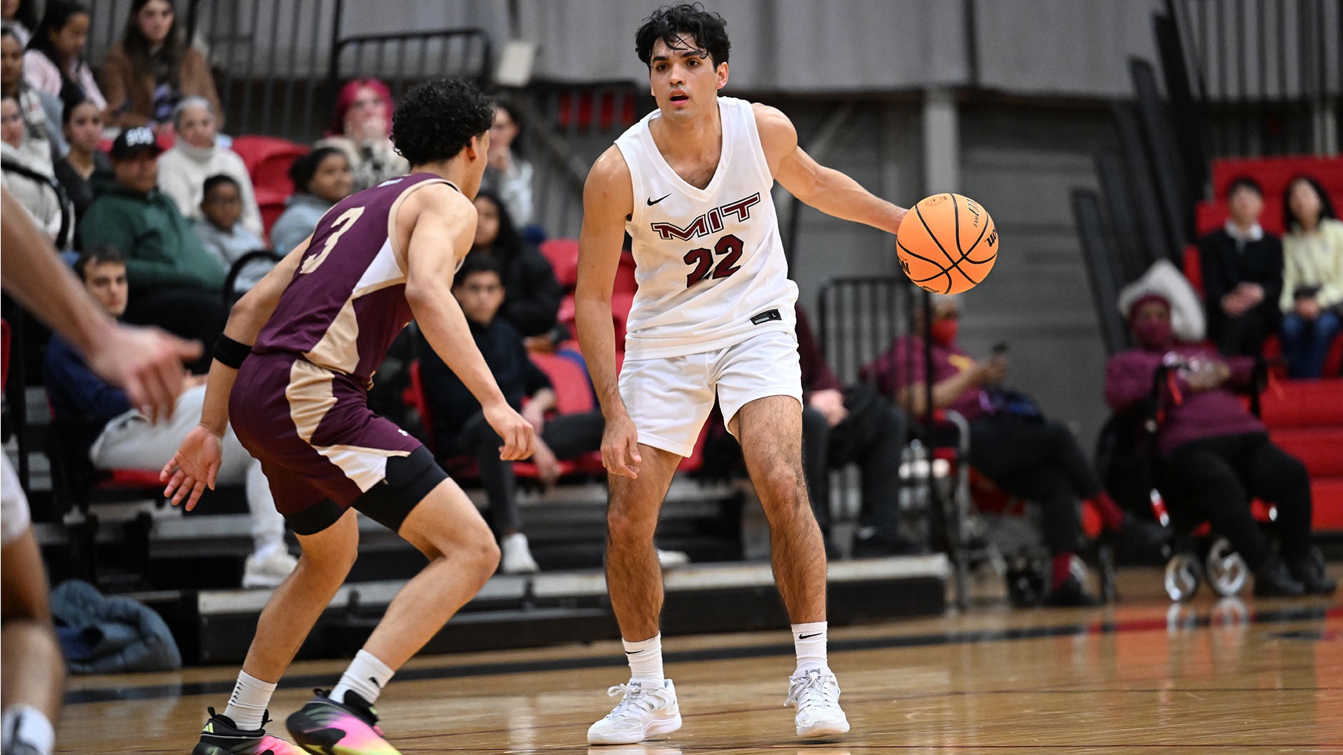 Rome Delgado-Gonzalez dribbling the basketball