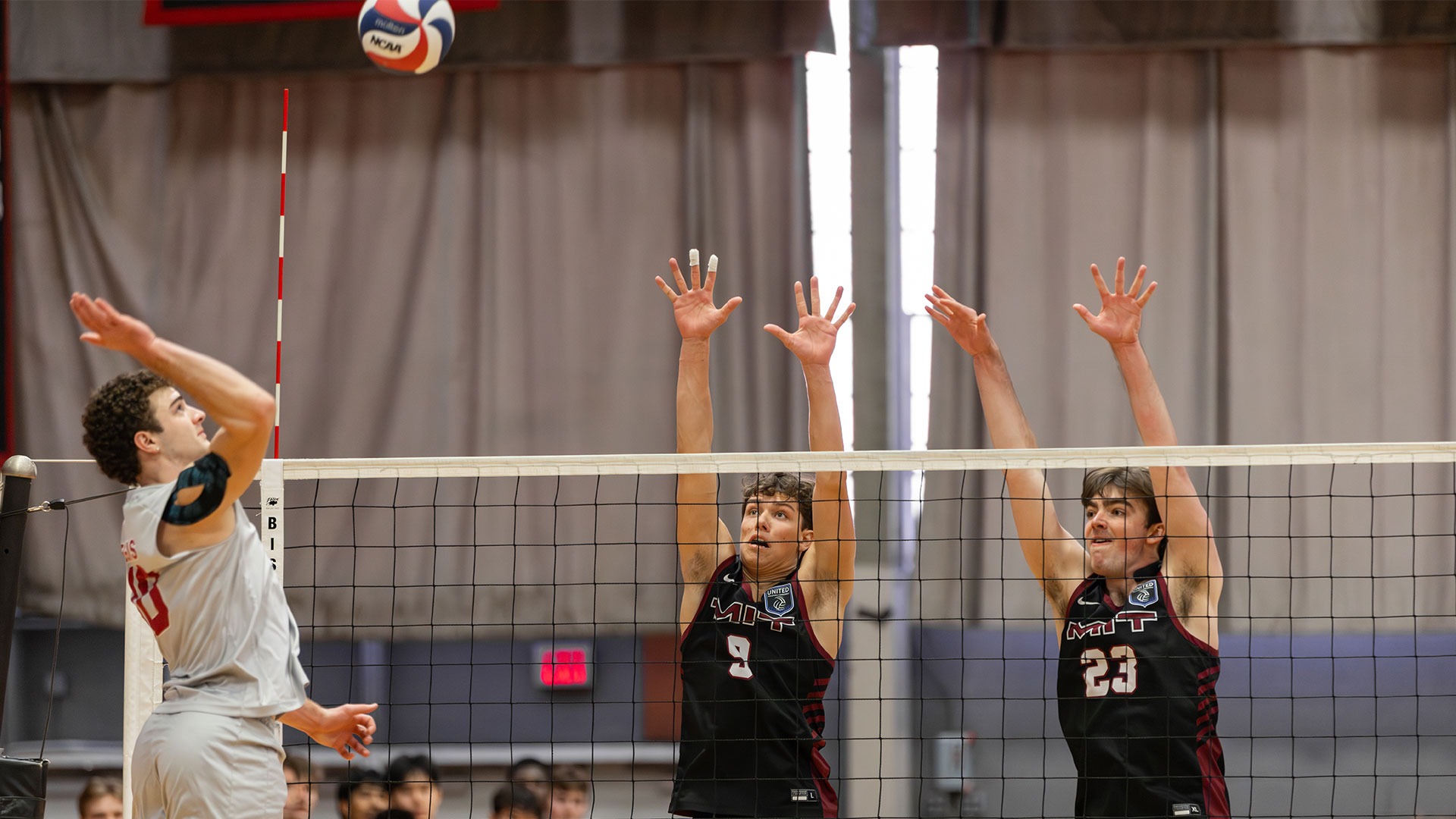 Alexander Garrett and Maddox Brandenburg going up for a block