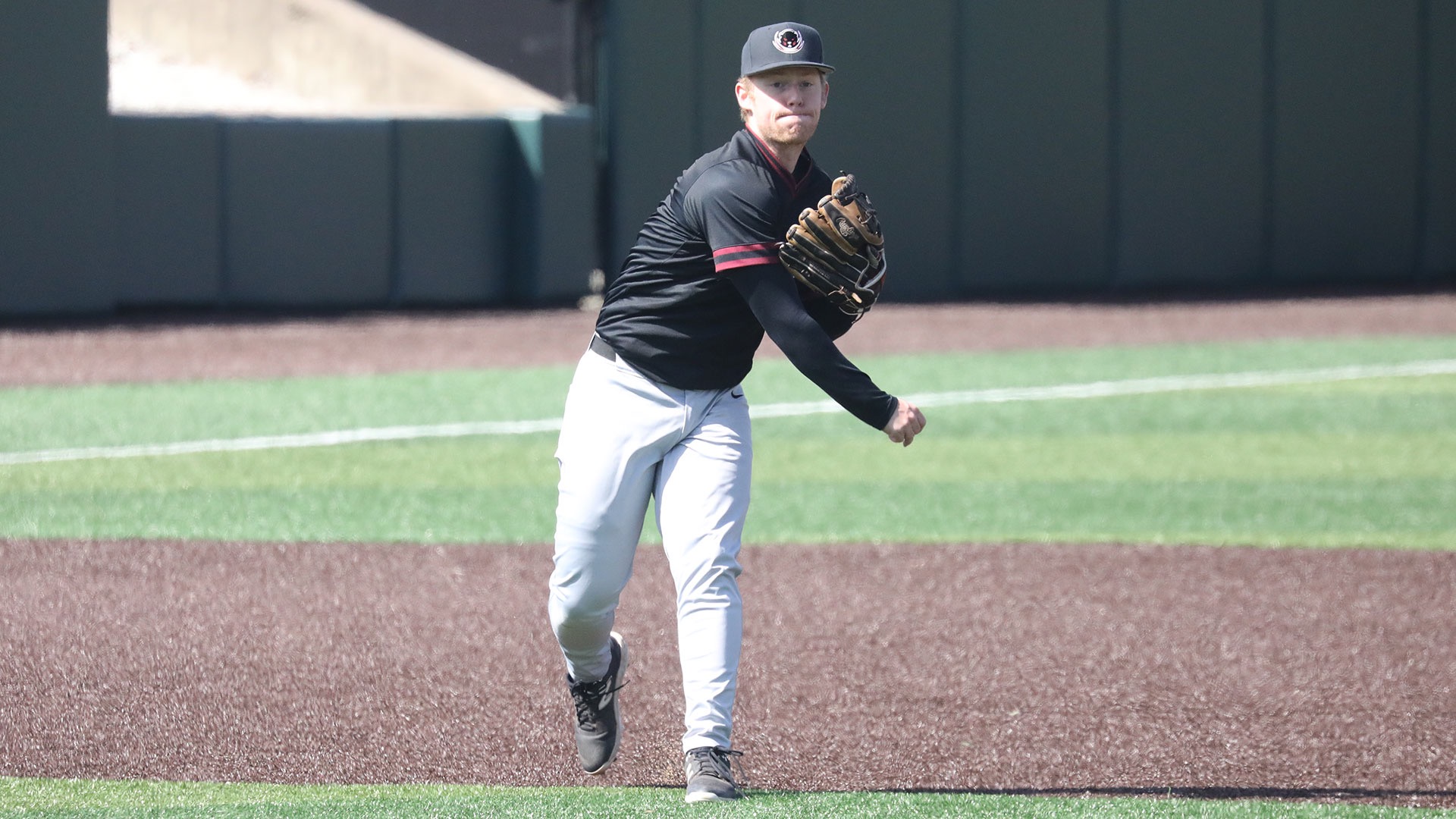 Owen Malone throwing a baseball