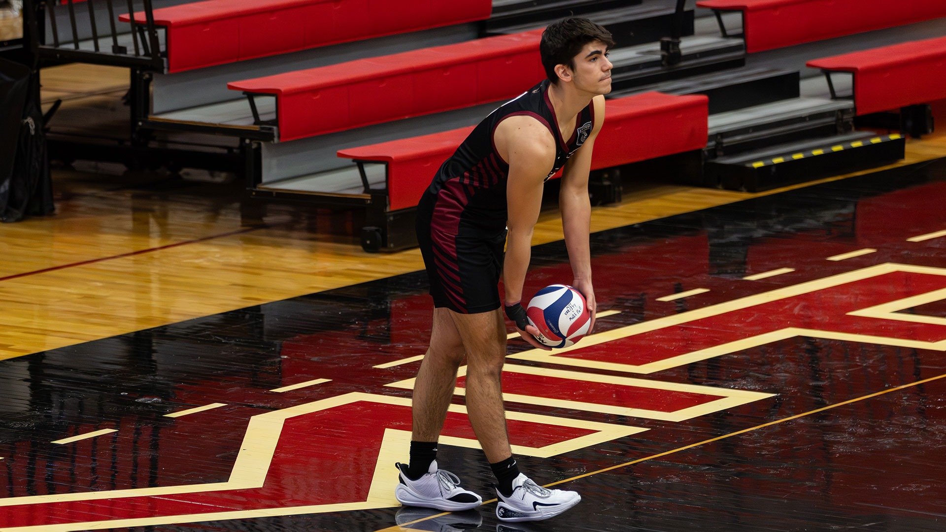 Nate Toth getting ready to serve