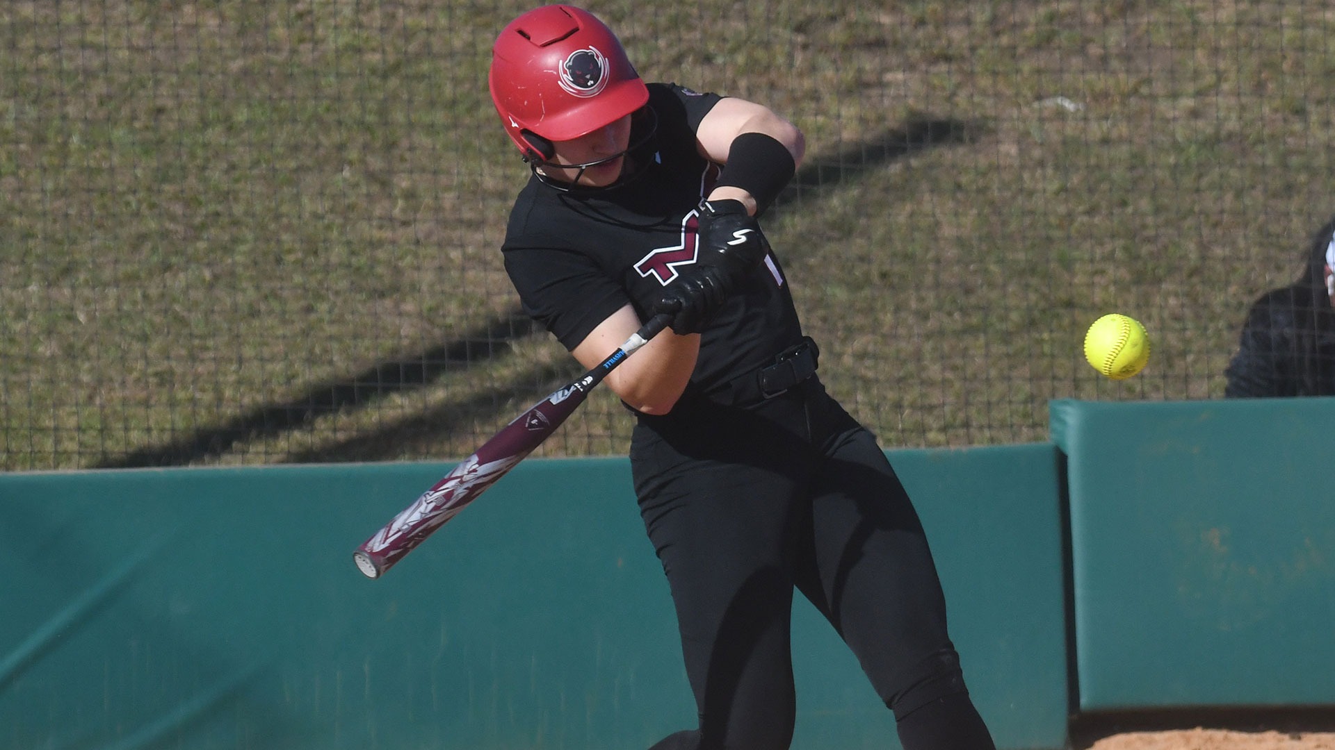 Julia Mattiace hitting a ball