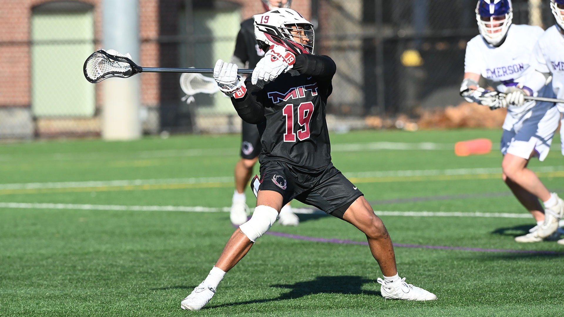 Riley Pierce in the process of taking a shot on goal