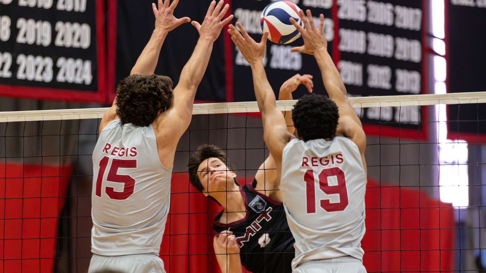 Ryan Espinoza hitting a volleyball