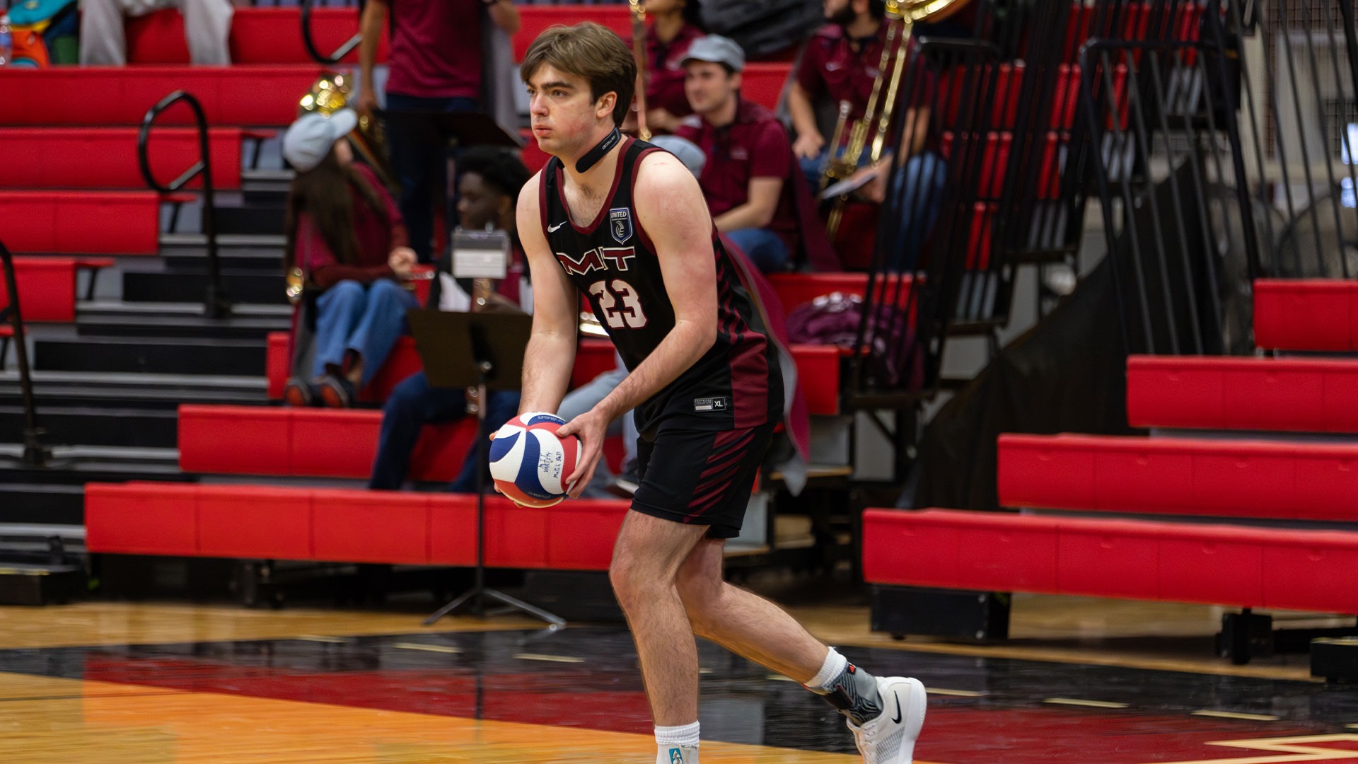 Maddox Bradenburg getting ready to serve