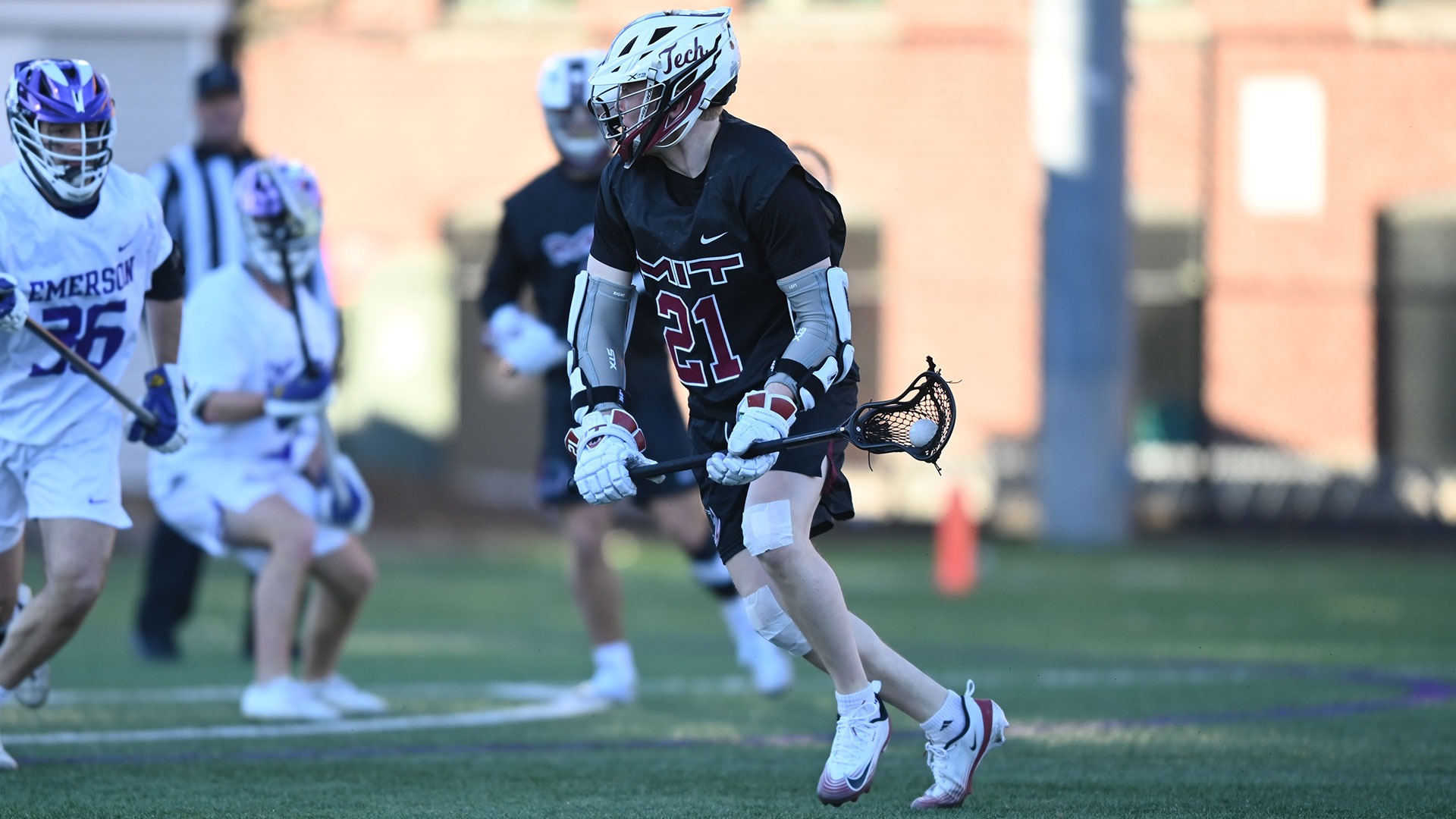Garrett Campagna holding the ball in his lacrosse stick