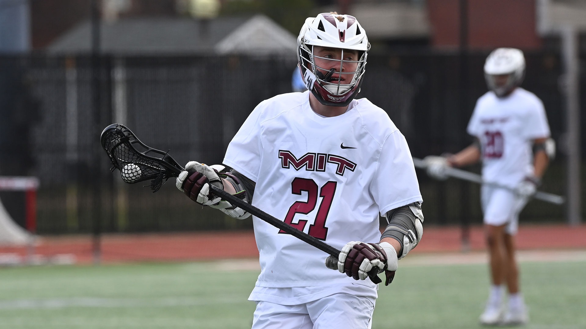 Garrett Campagna holding the ball in his lacrosse stick