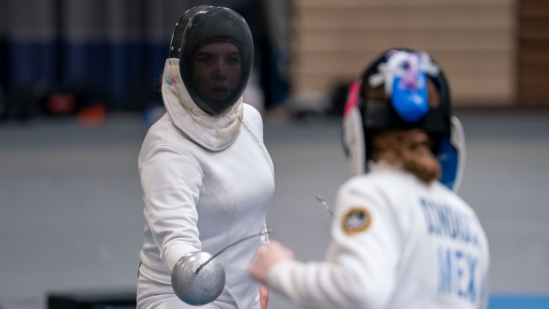 Zandra Feland moving towards her opponent