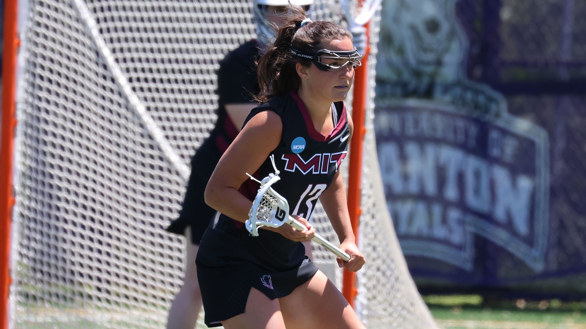 Gwen Flusche playing lacrosse