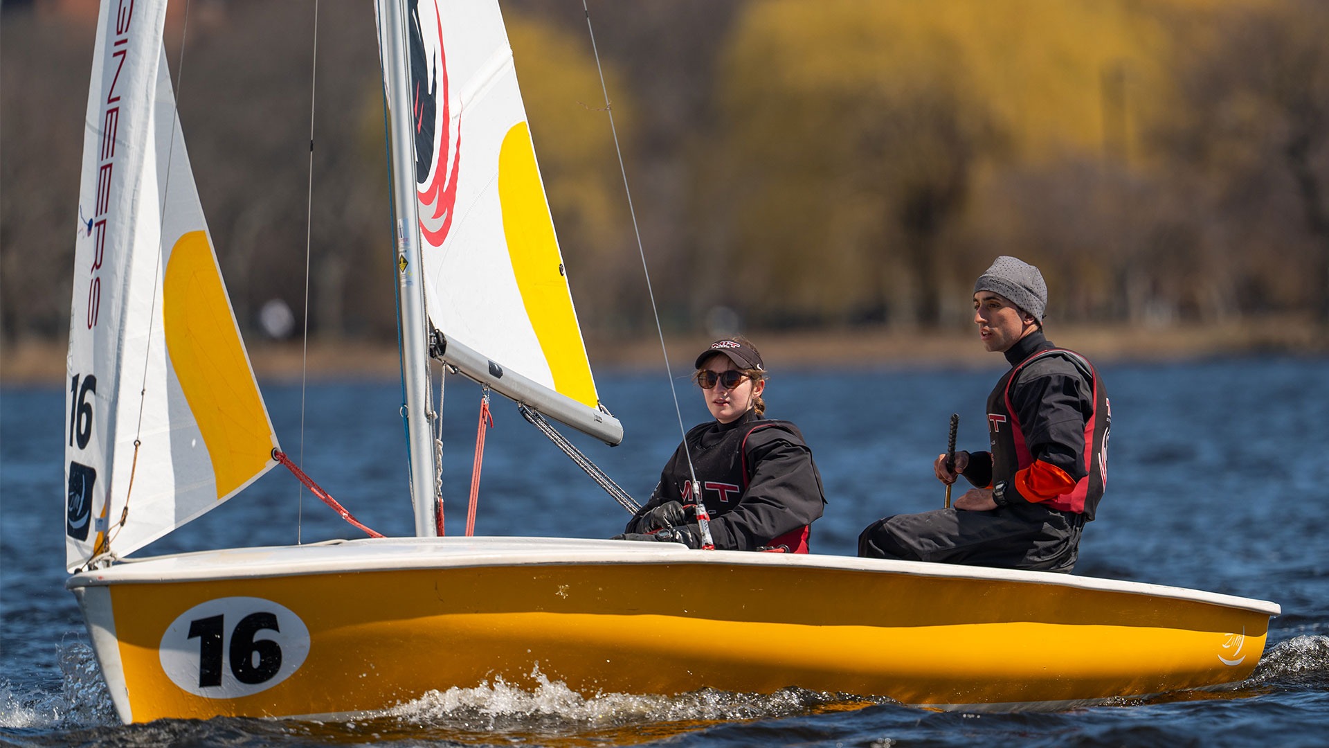 Elliott Chalcraft and Will Kulas on a sailboat