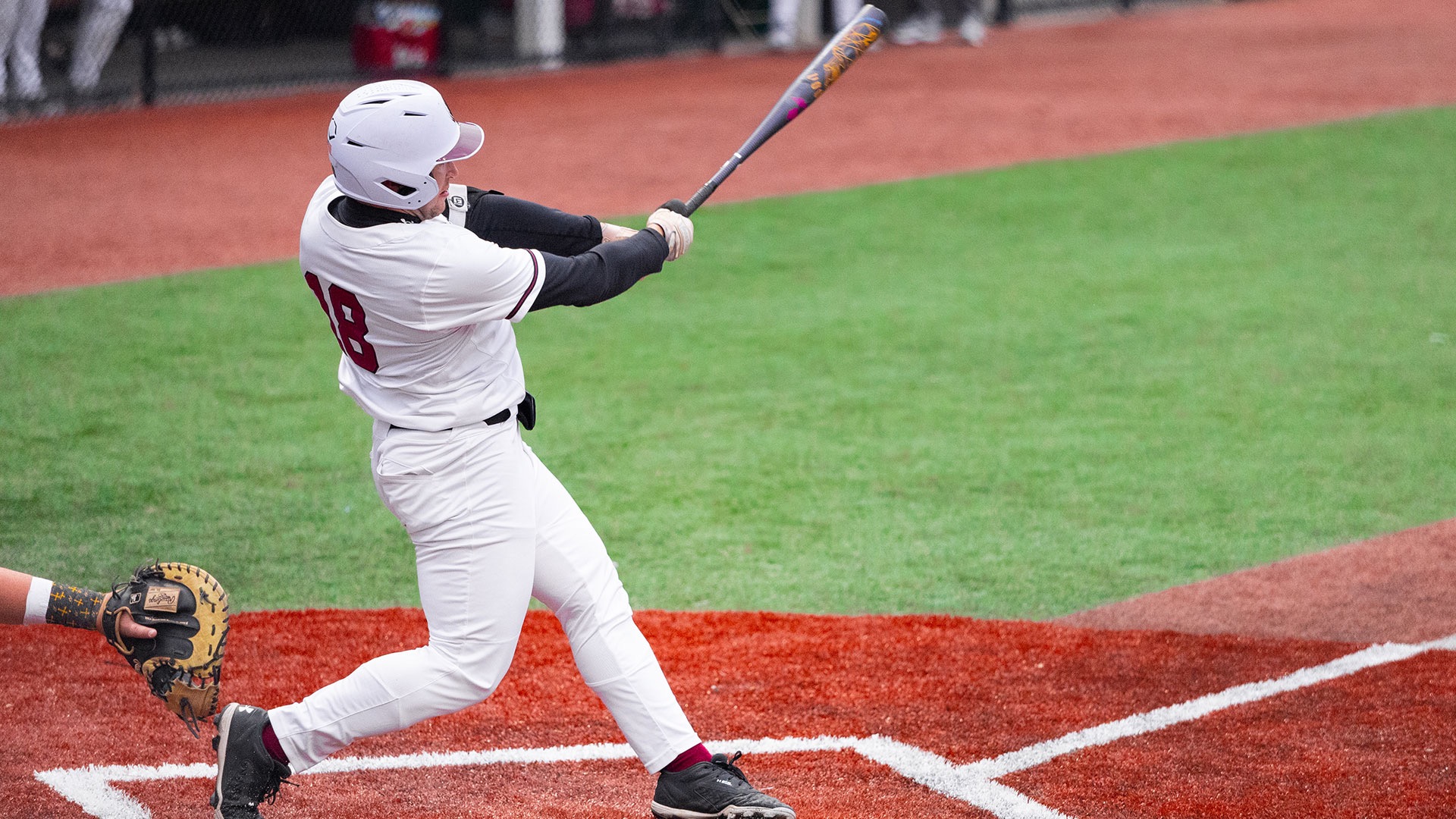 Titan Moore swinging a bat