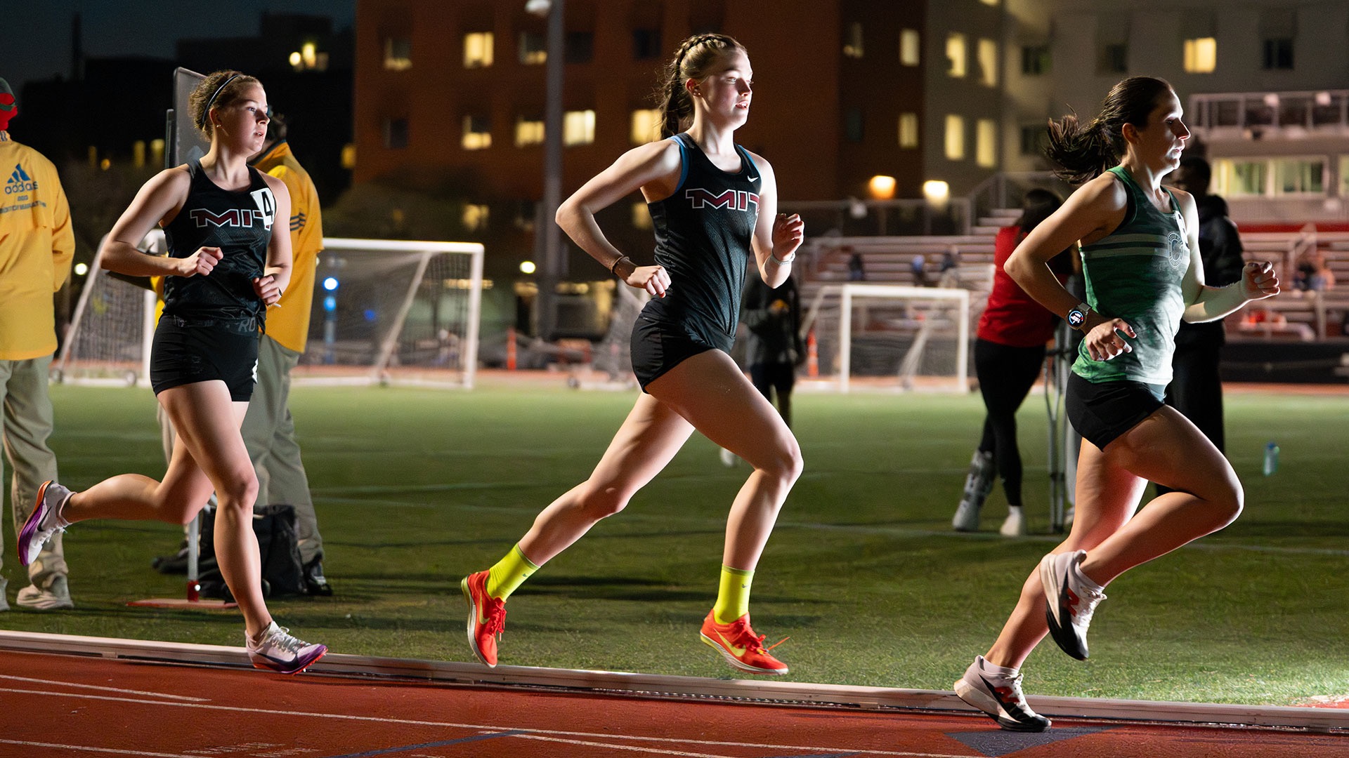 Kate Sanderson and Liv Girand running at night