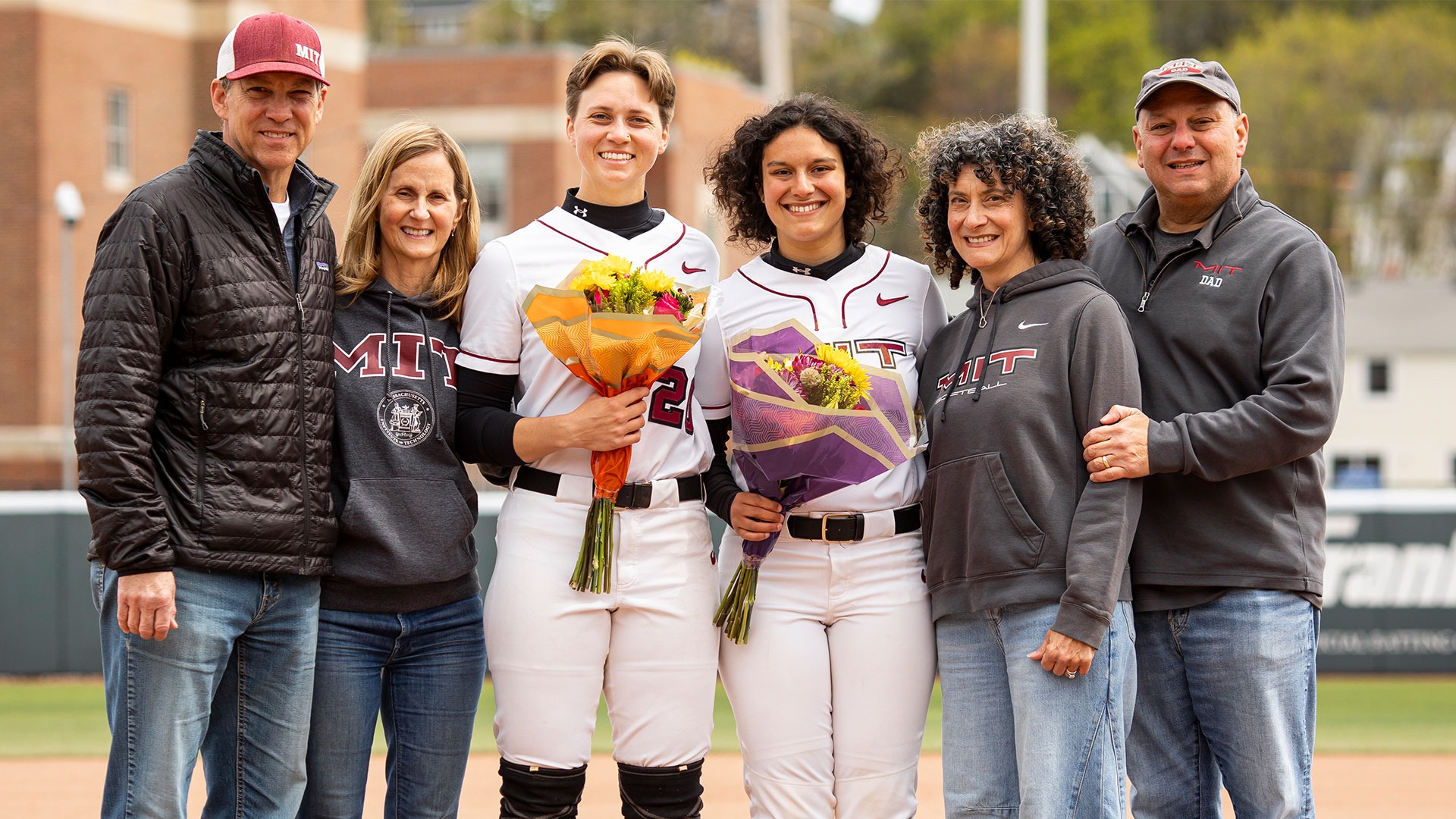 Ava Ladd and Parents and Olivia Scarpaci and Parents at Senior Day