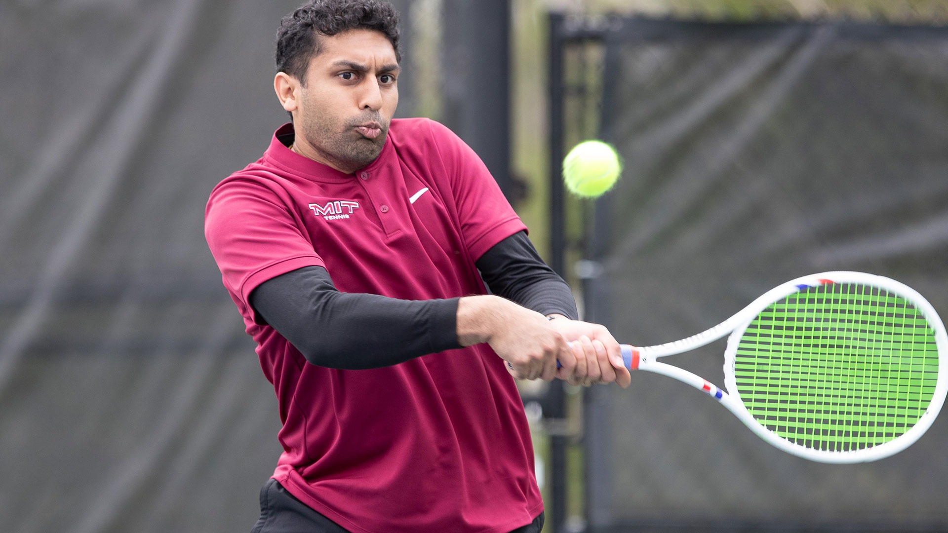 Rushil Patel hitting a forehand