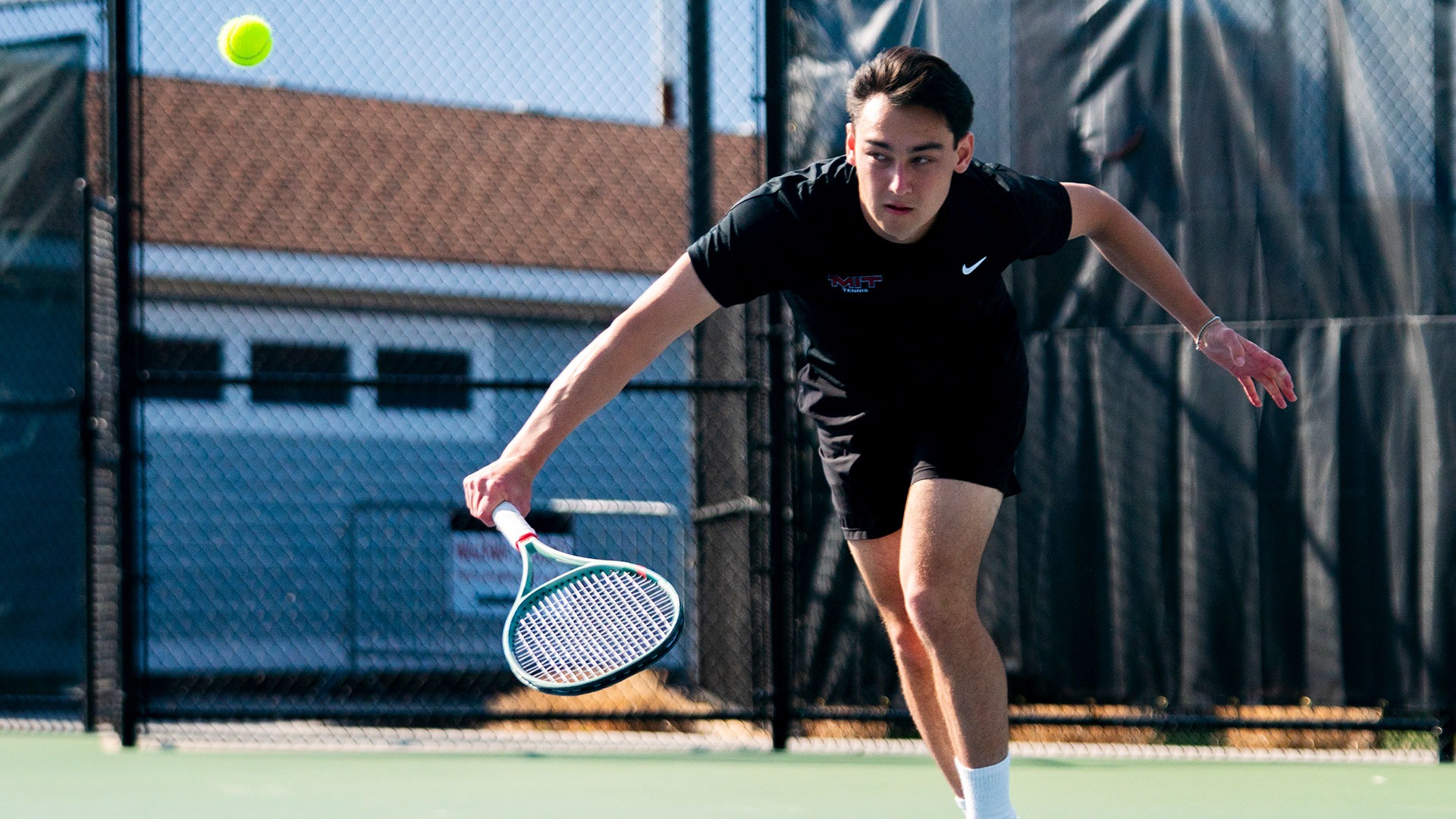 Grant Gallagher hitting a volley