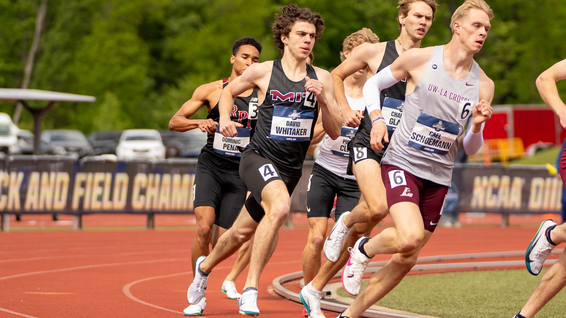 David Whitaker running on a track