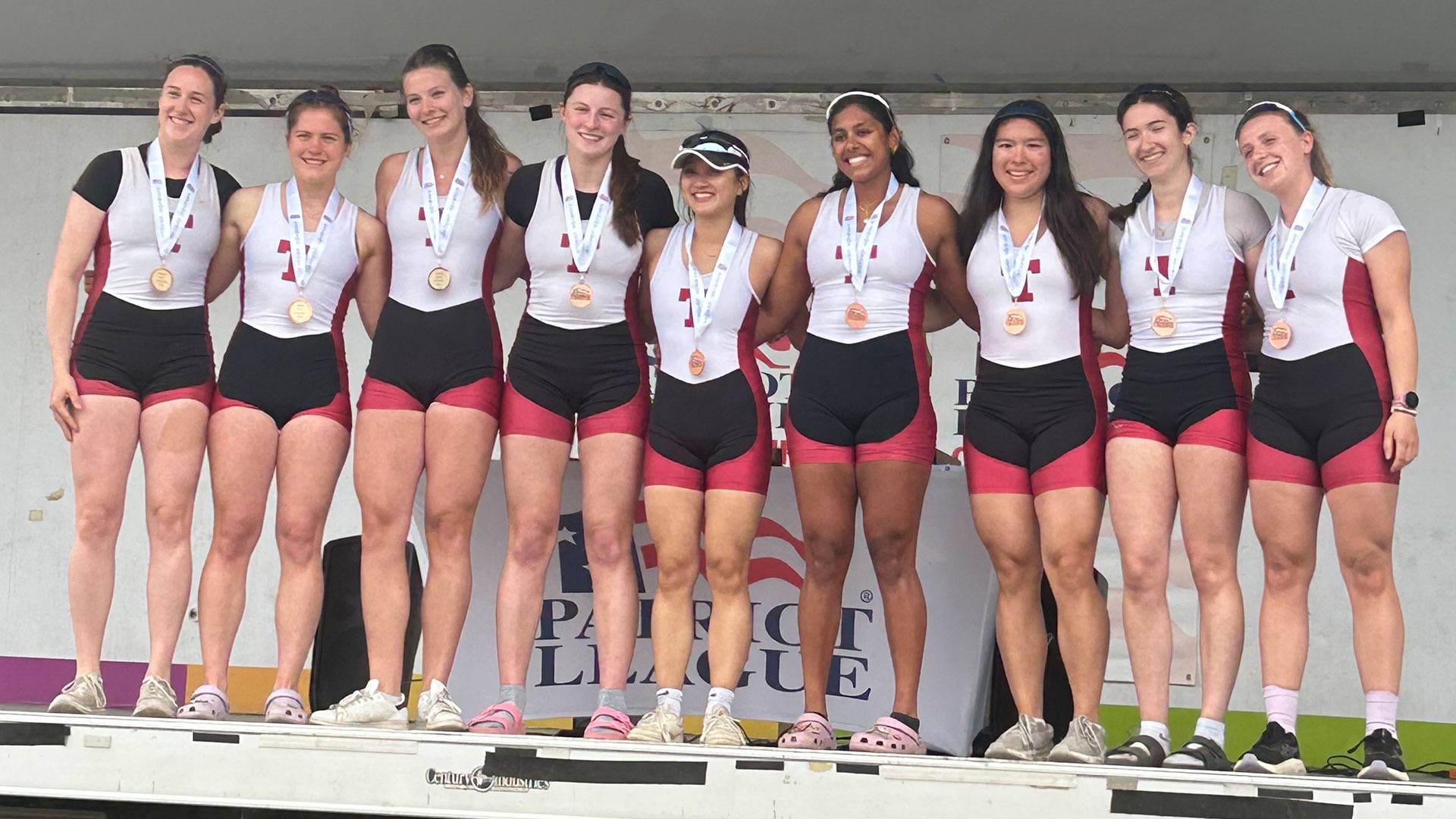 women's varsity eight on the podium