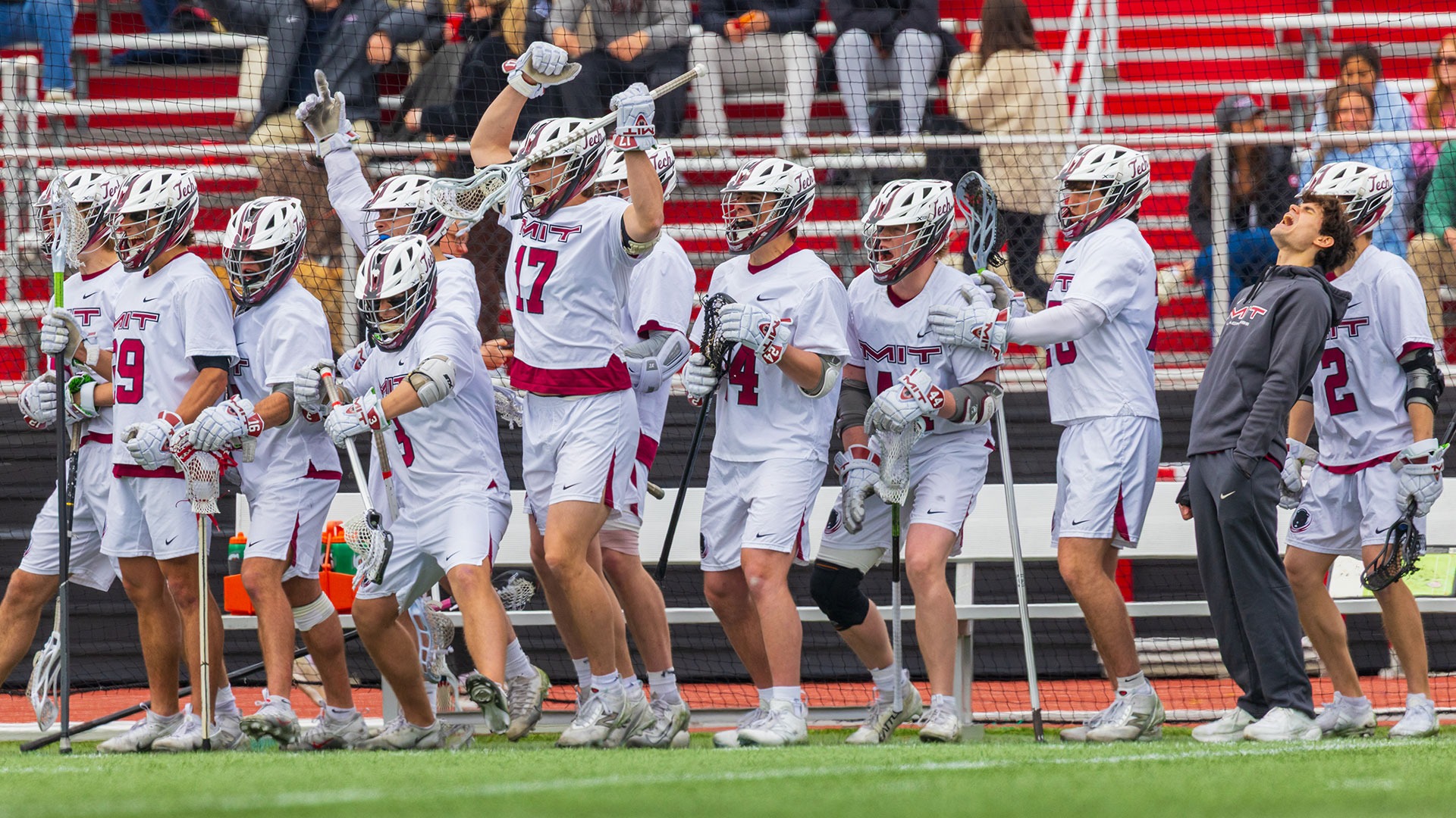 The men's lacrosse team celebrating