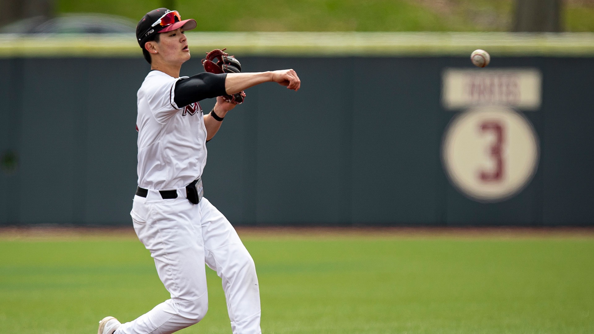 Dalton Chi throwing a baseball