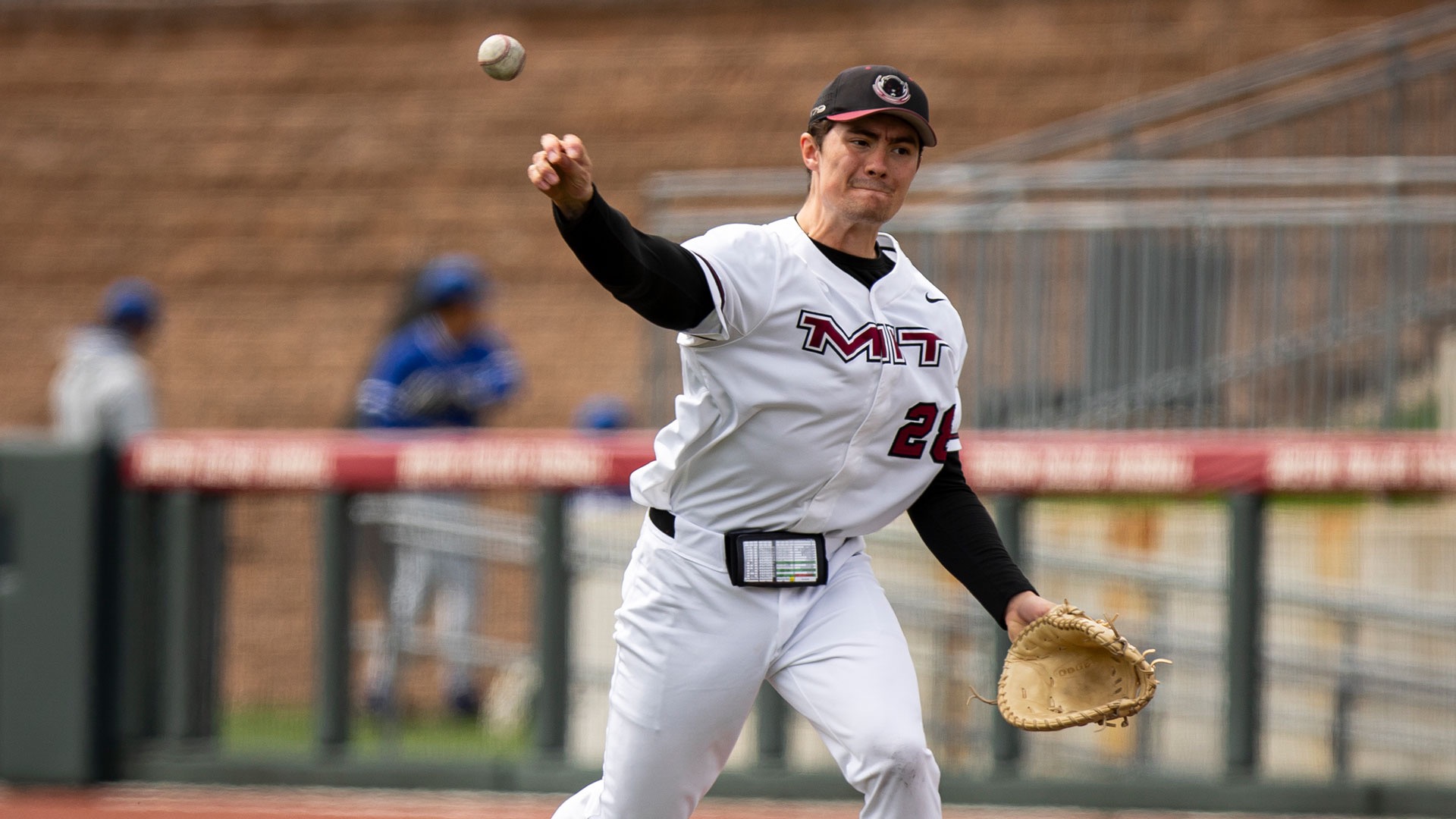 James Dempsey throwing a baseball
