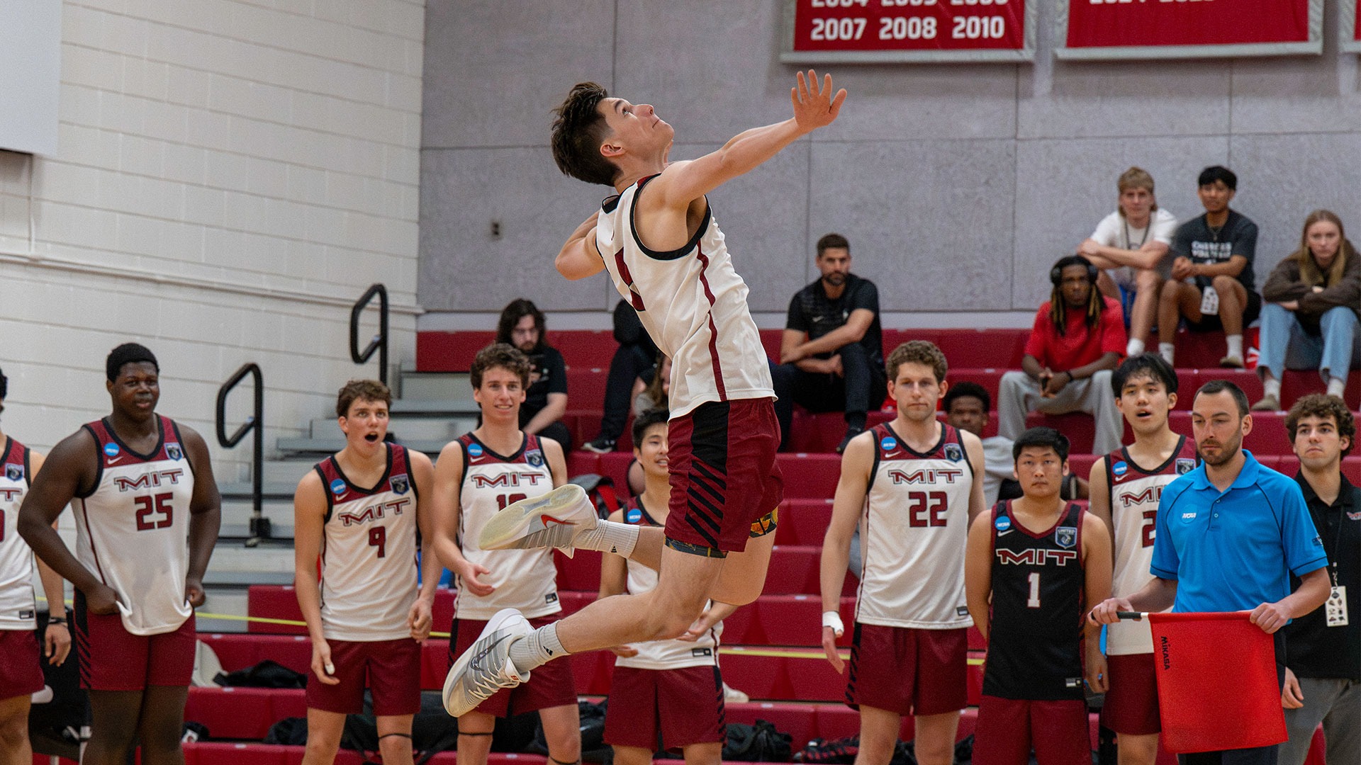 Ryan Espinoza going up for a serve