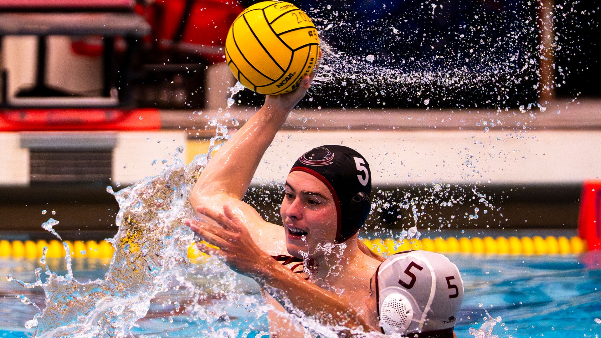 Caspar Lightner holding a water polo ball