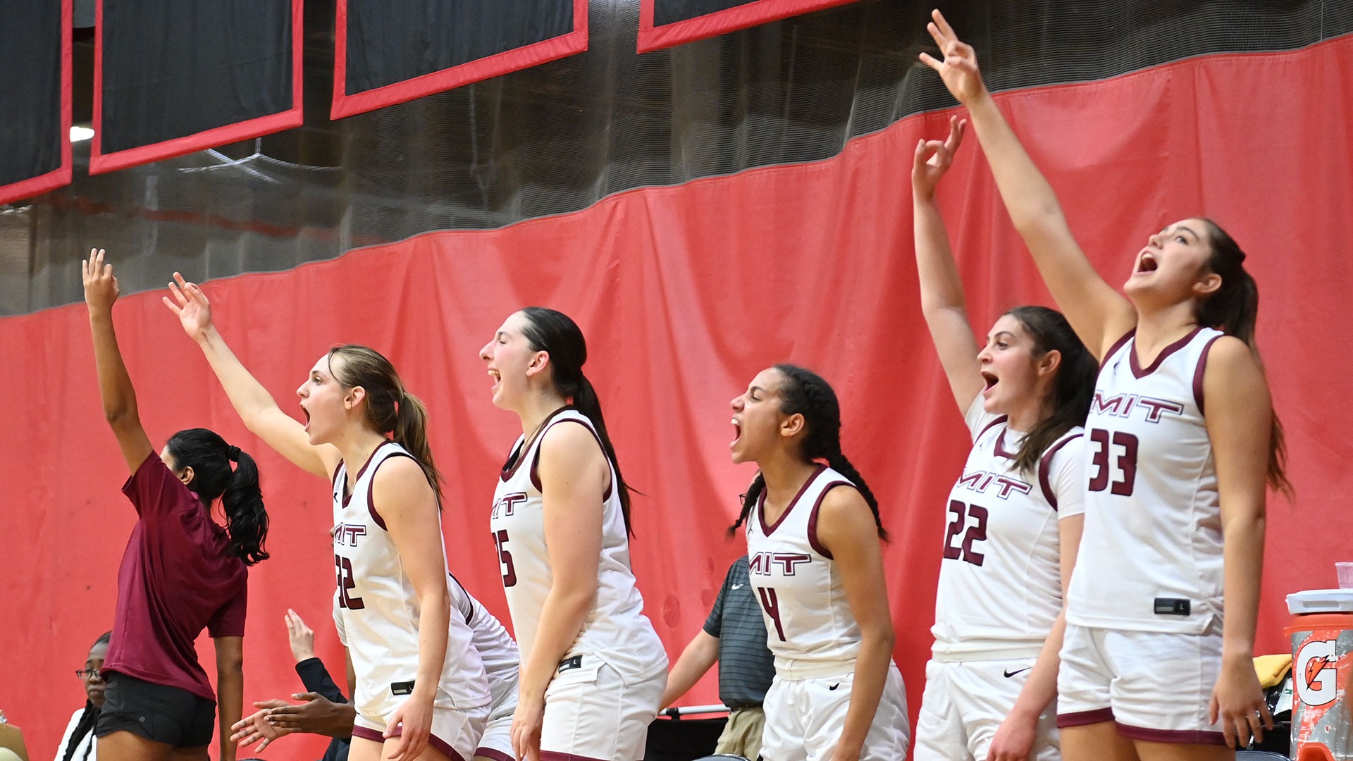 Members of the women's basketball team celebrating