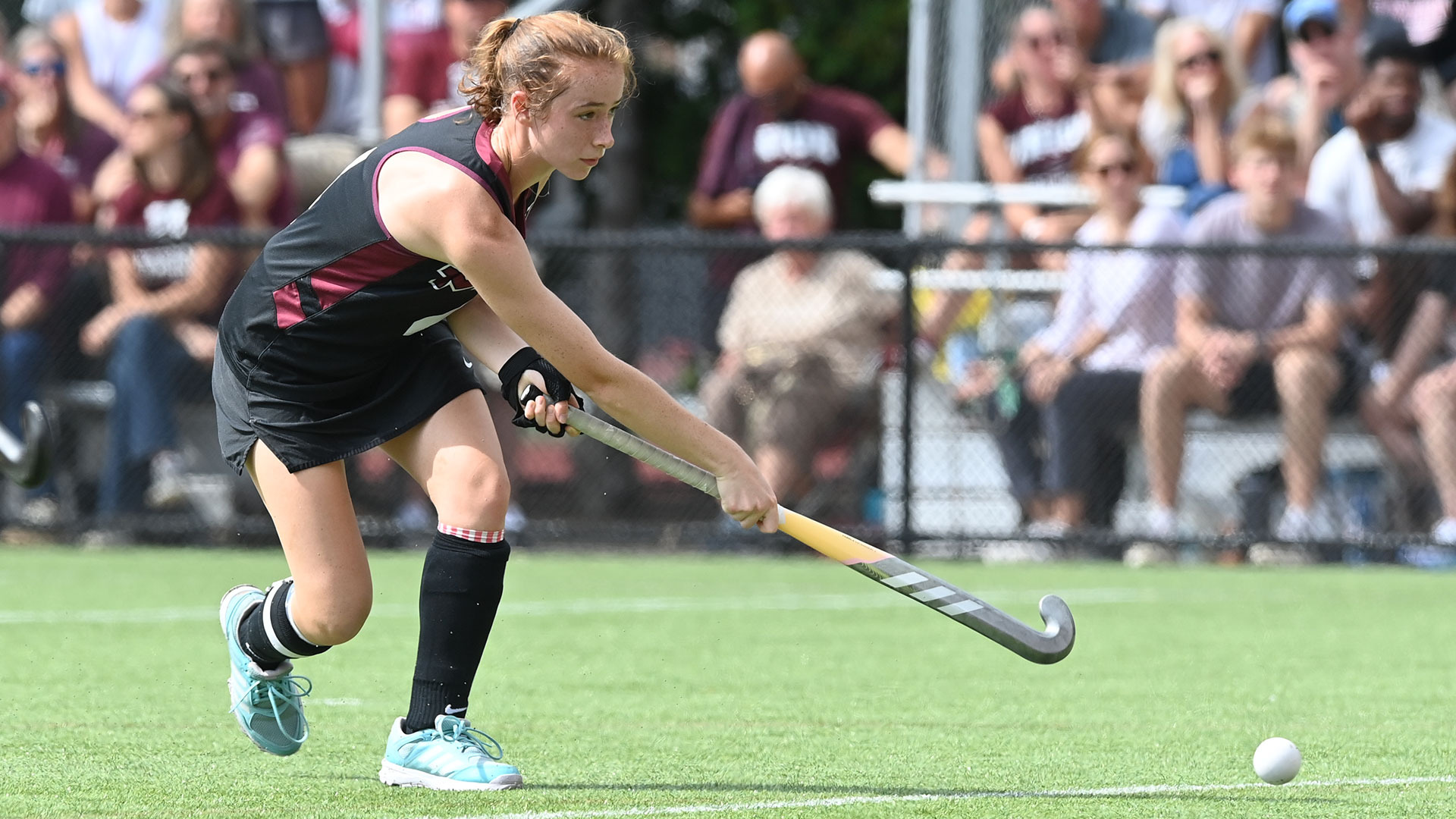 Bailey McIntyre playing field hockey for MIT