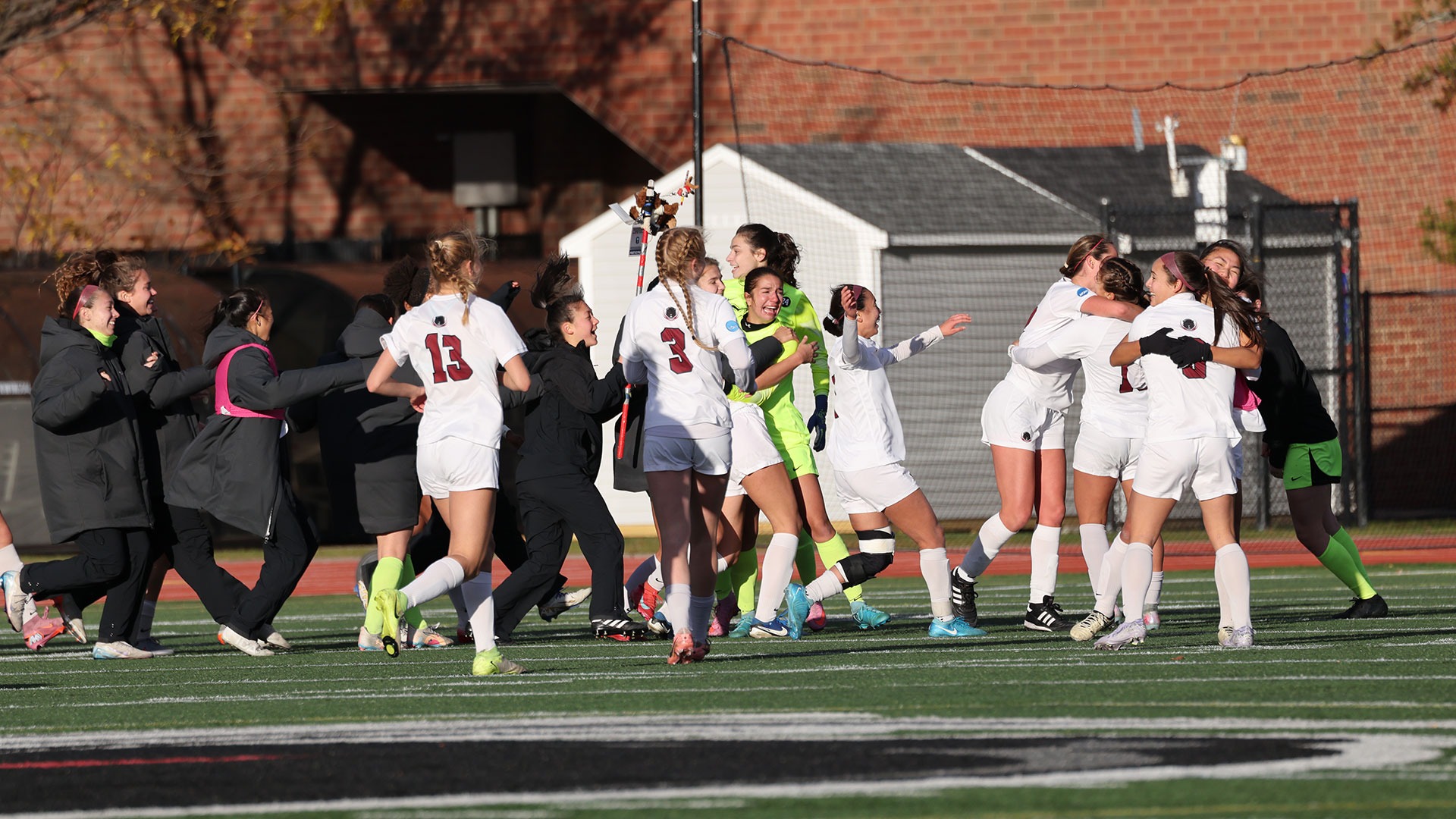 Women's Soccer Team Celebrating 
