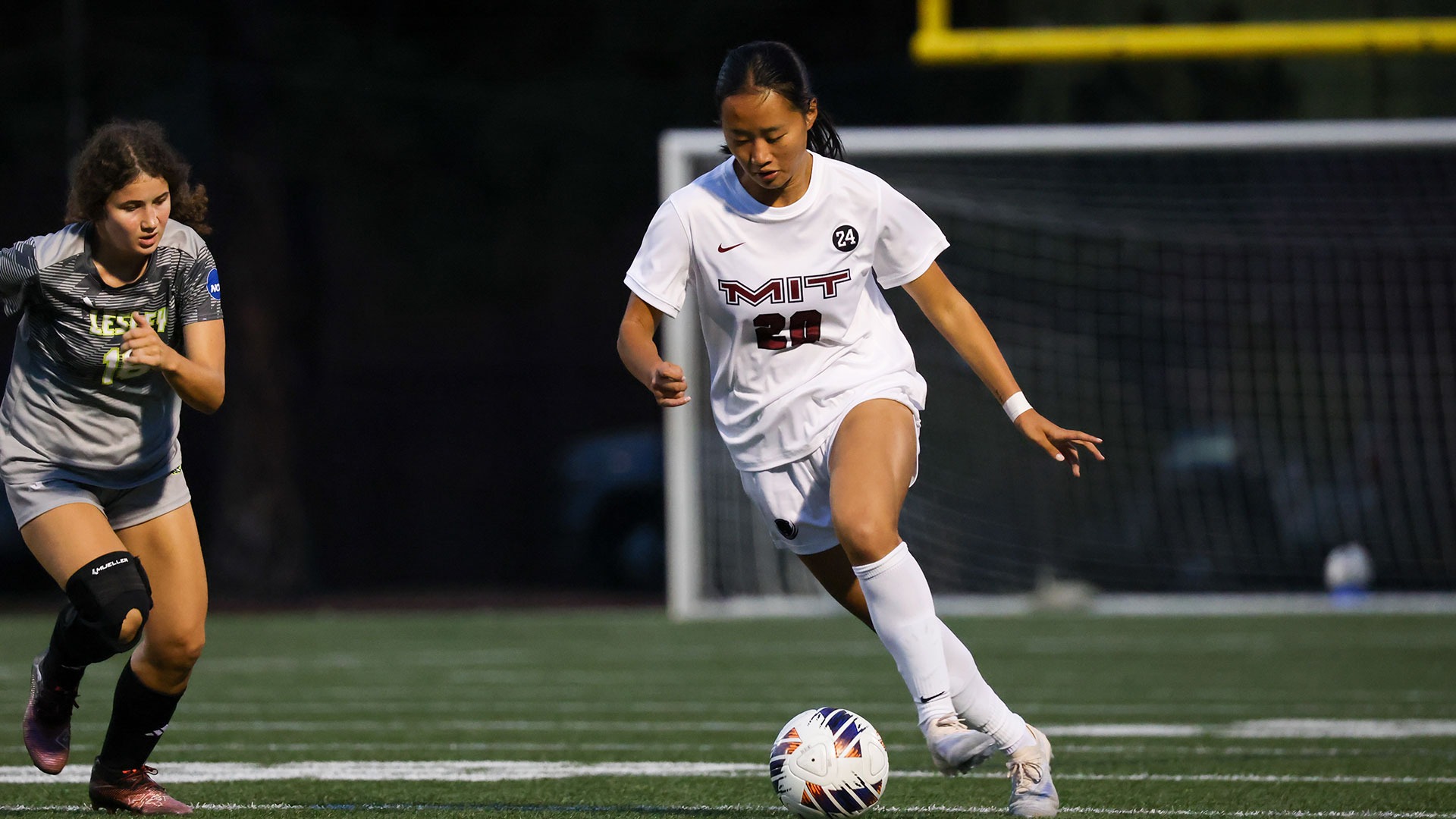 Chloe Dai going past a defender