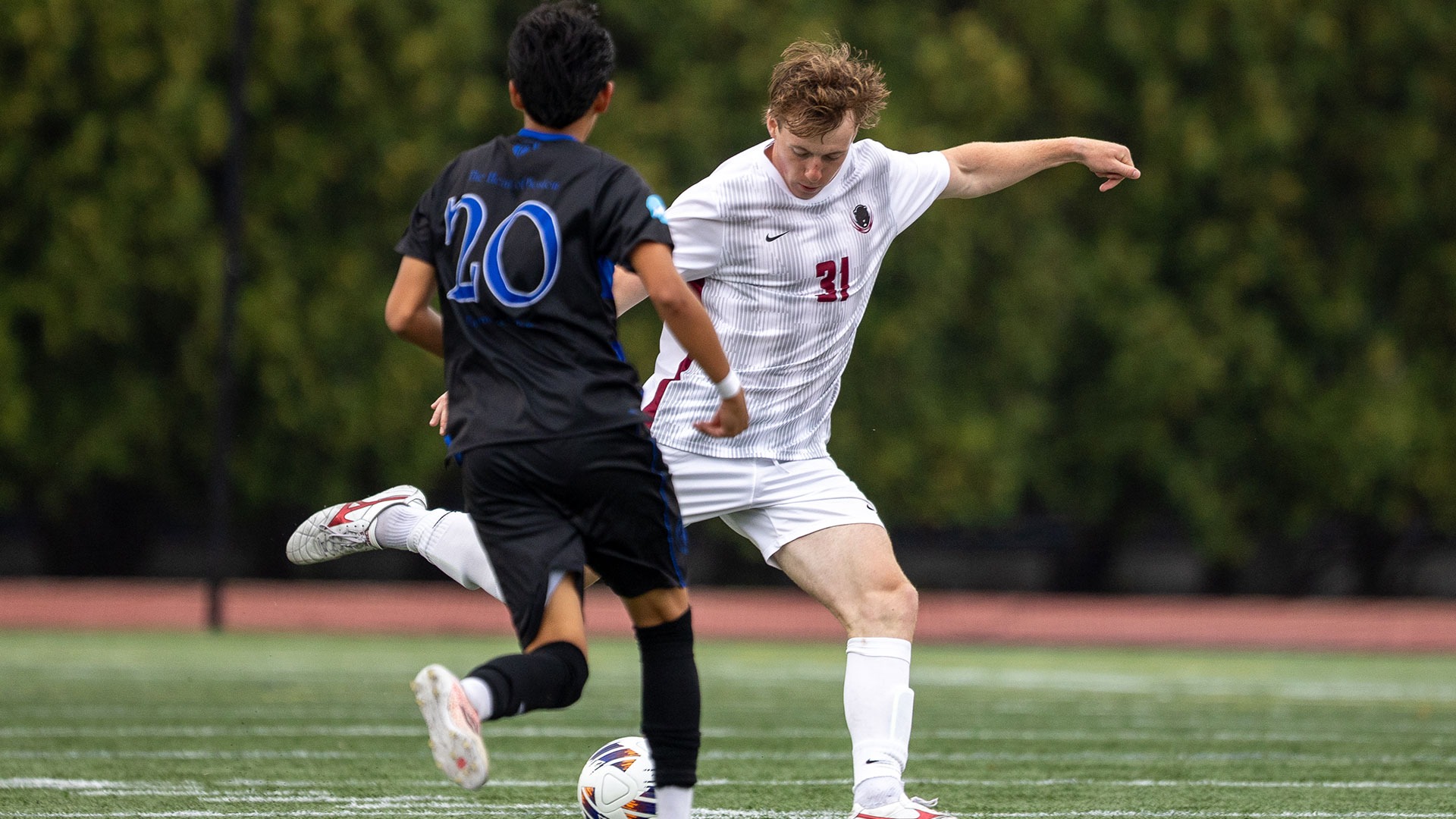 Max Cassidy getting by a defender