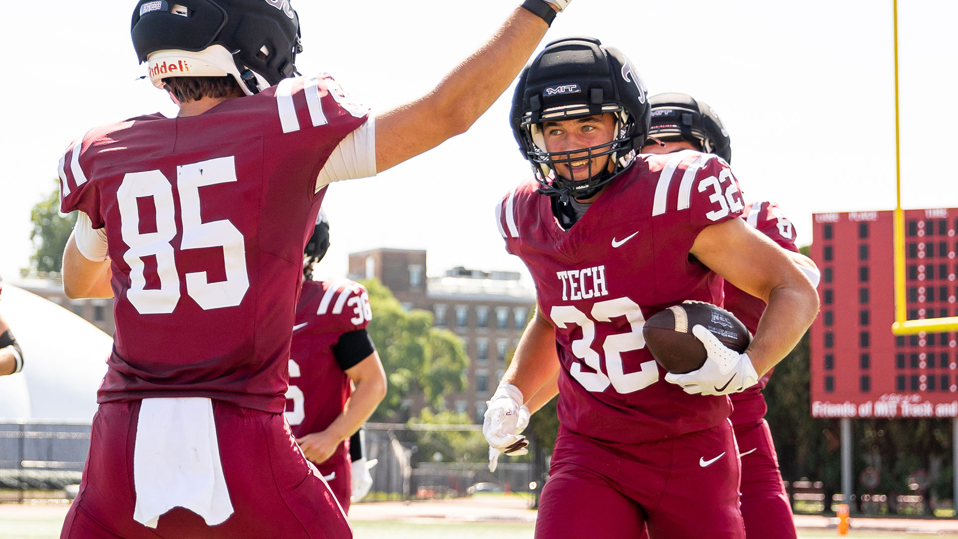 Mateo Kamarck celebrates on the MIT sideline with the football