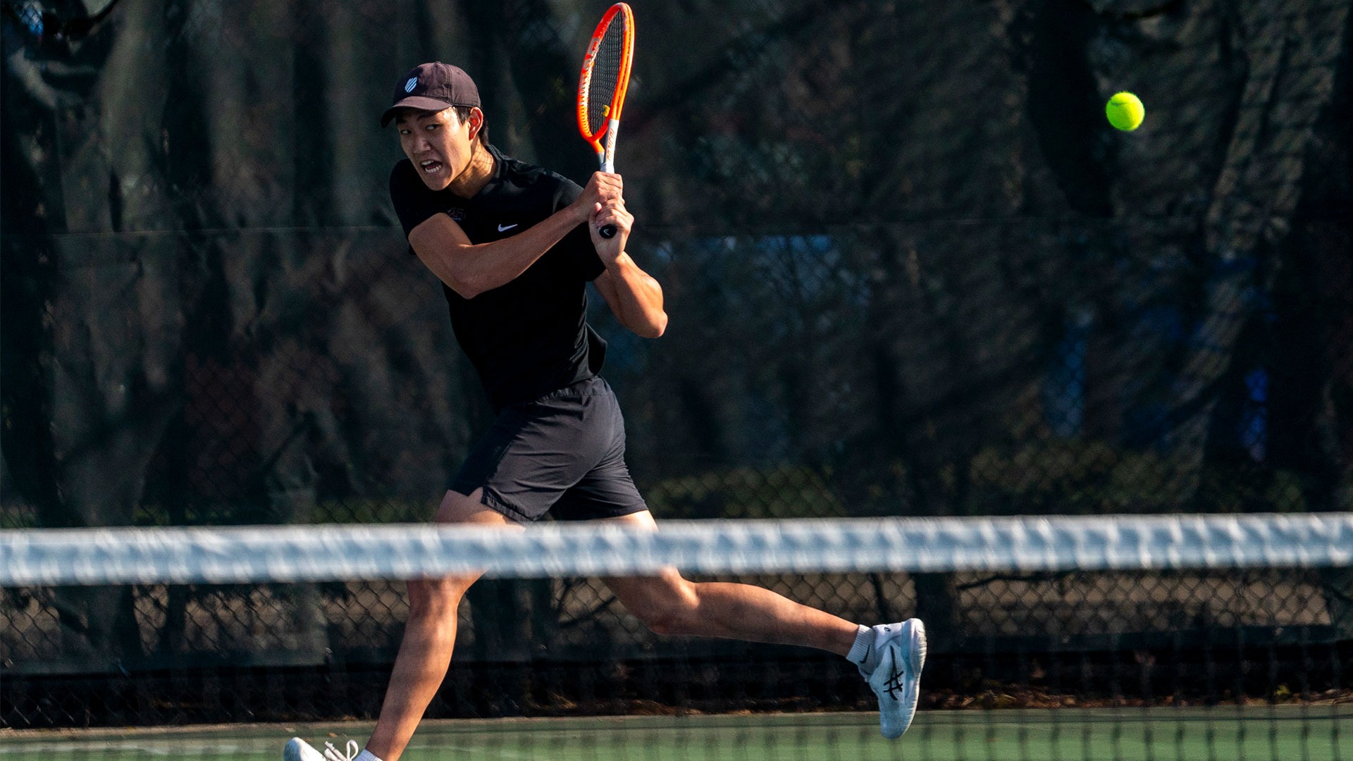 Adam Sun hitting a shot