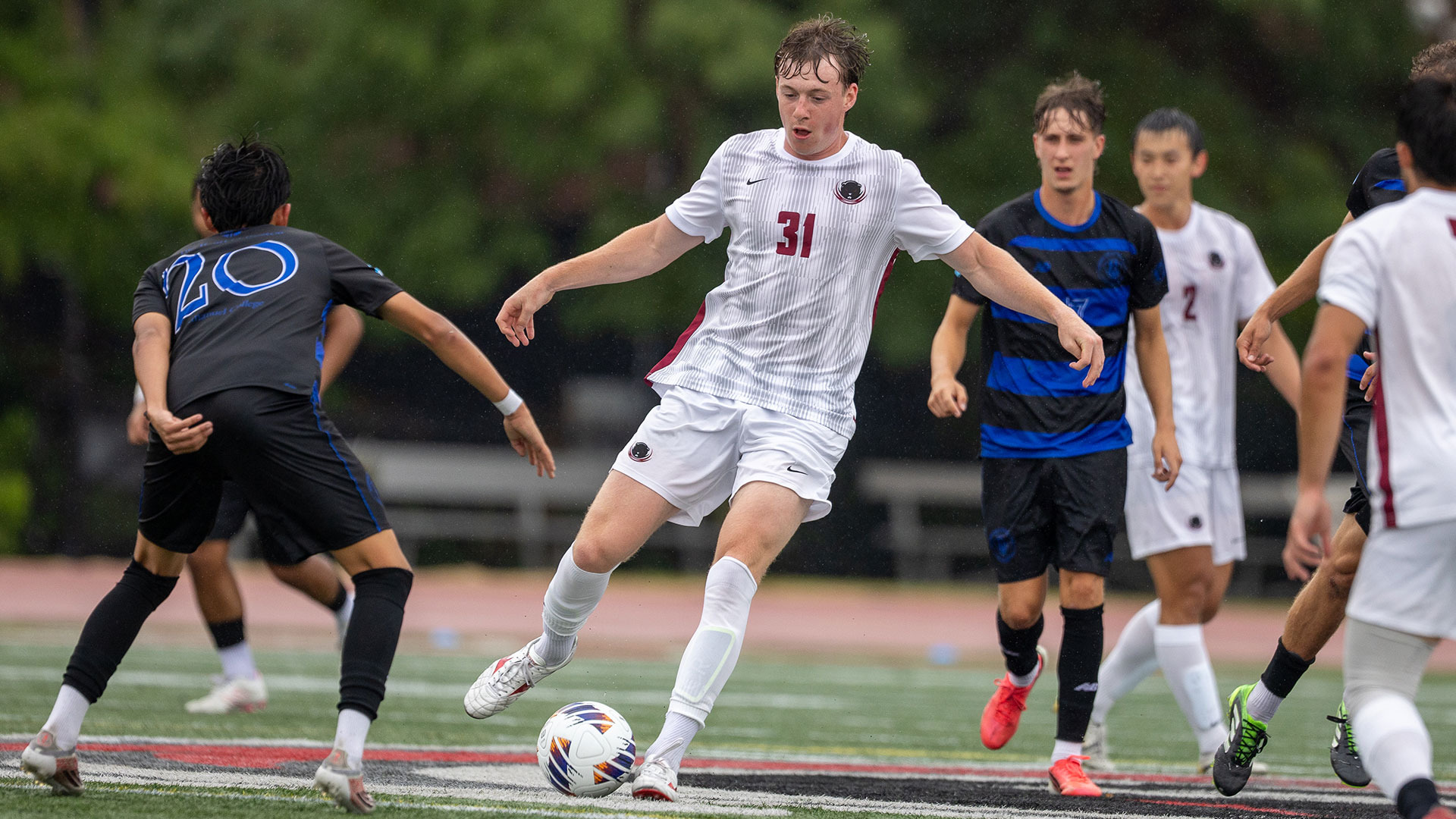 Max Cassidy dribbles the ball downfield