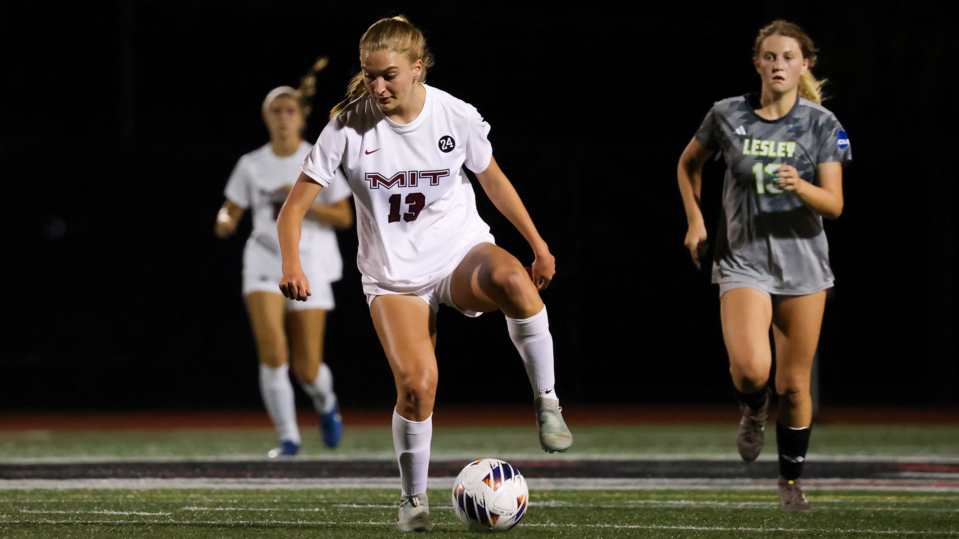 Ayla Sumer dribbling a soccer ball