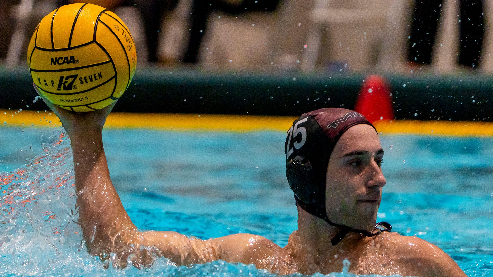 William Ewald holding a water polo ball