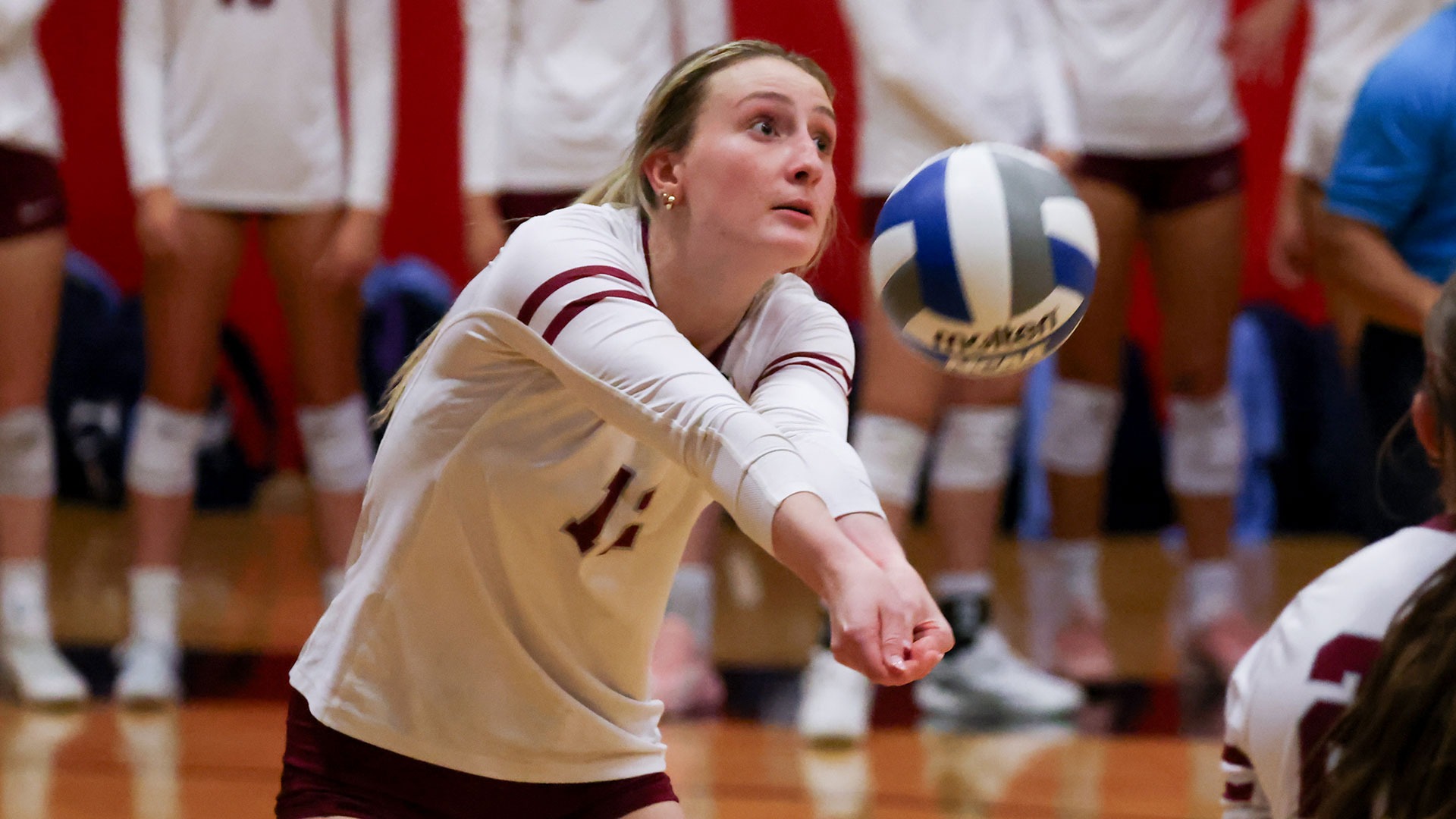 Miller Grimes digging the volleyball