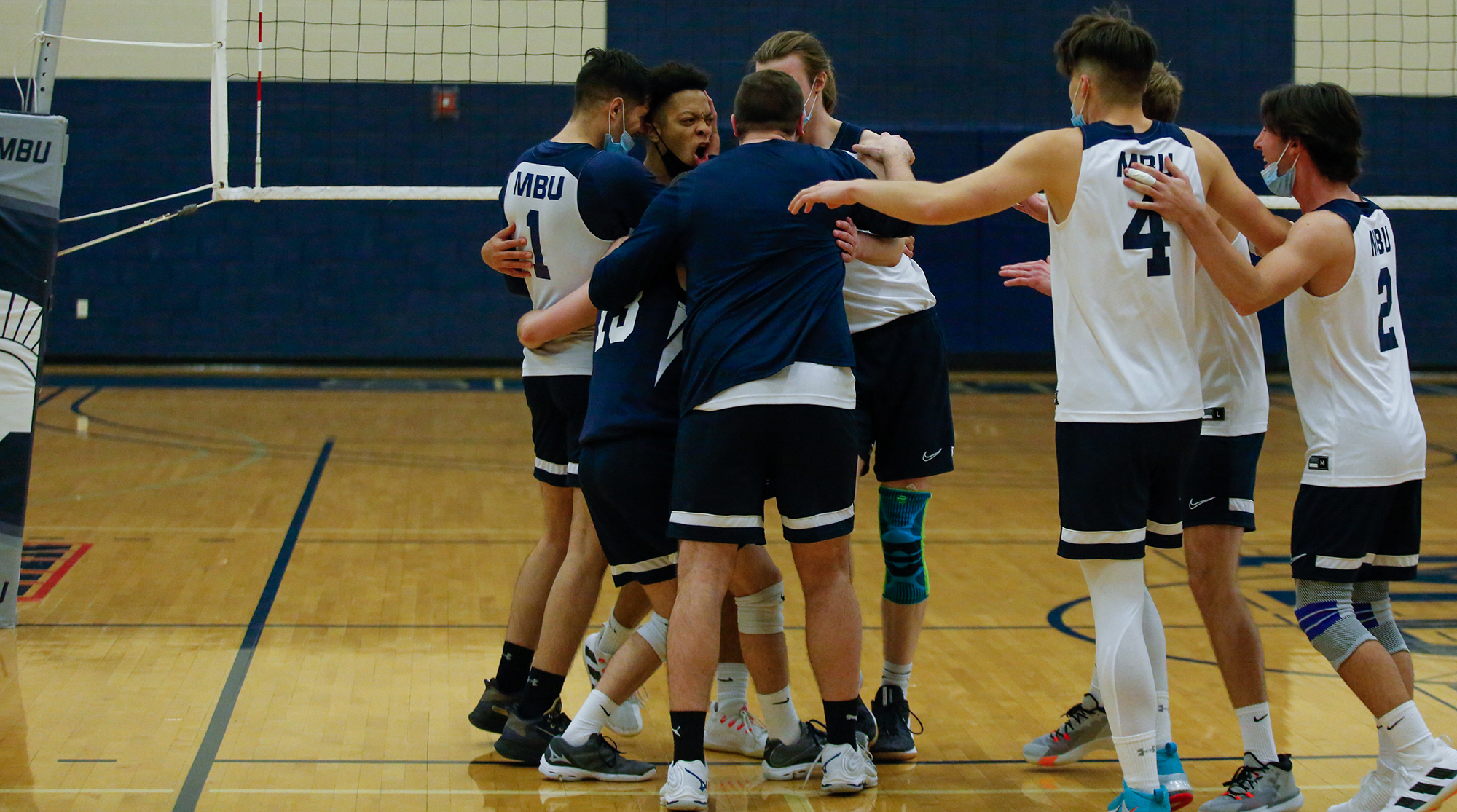 12THRANKED SPARTANS EDGE OUT QUINCY IN SEASON OPENER MBU Athletics