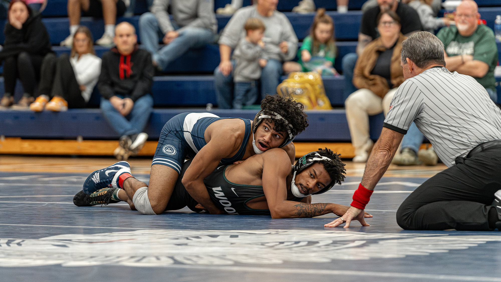 Daryl Mills rides his opponent from William Woods (Mo.)