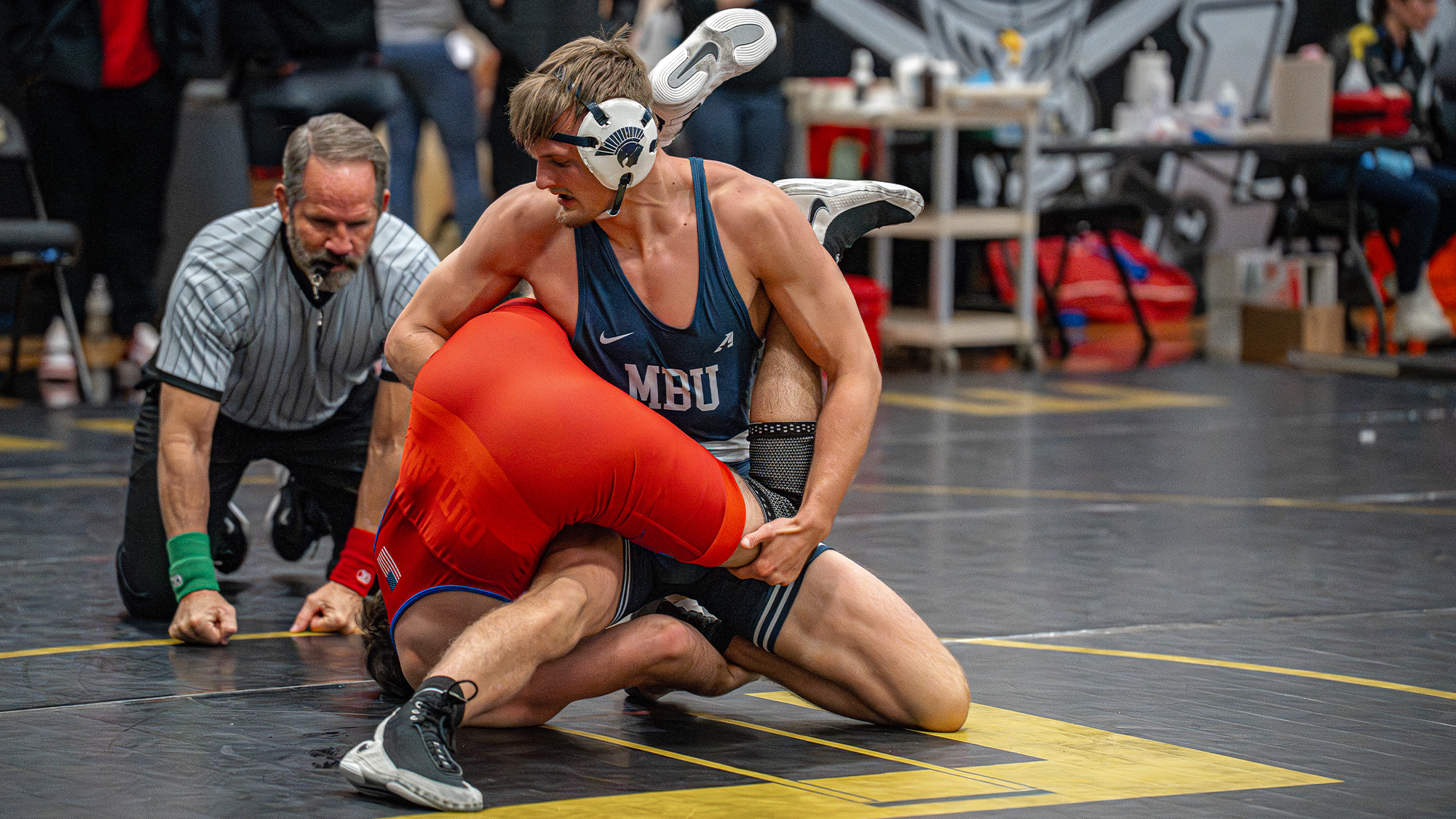 Campbell turns to get the takedown