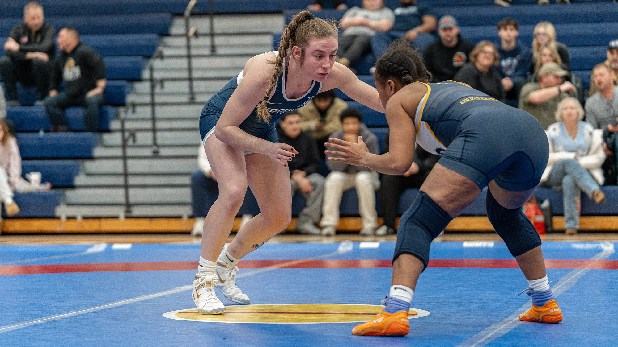 Fries wrestles her opponent from William Penn (Iowa)
