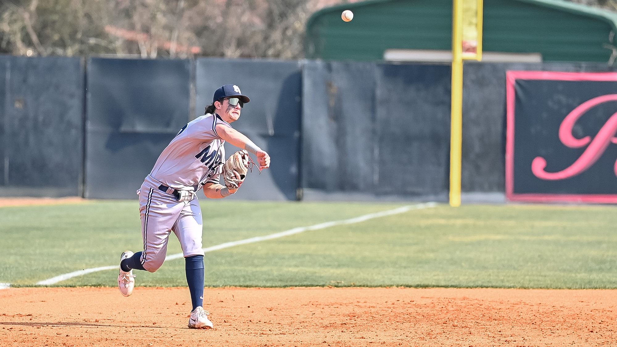 Angelo Franco throws across the diamond vs No. 11 William Carey