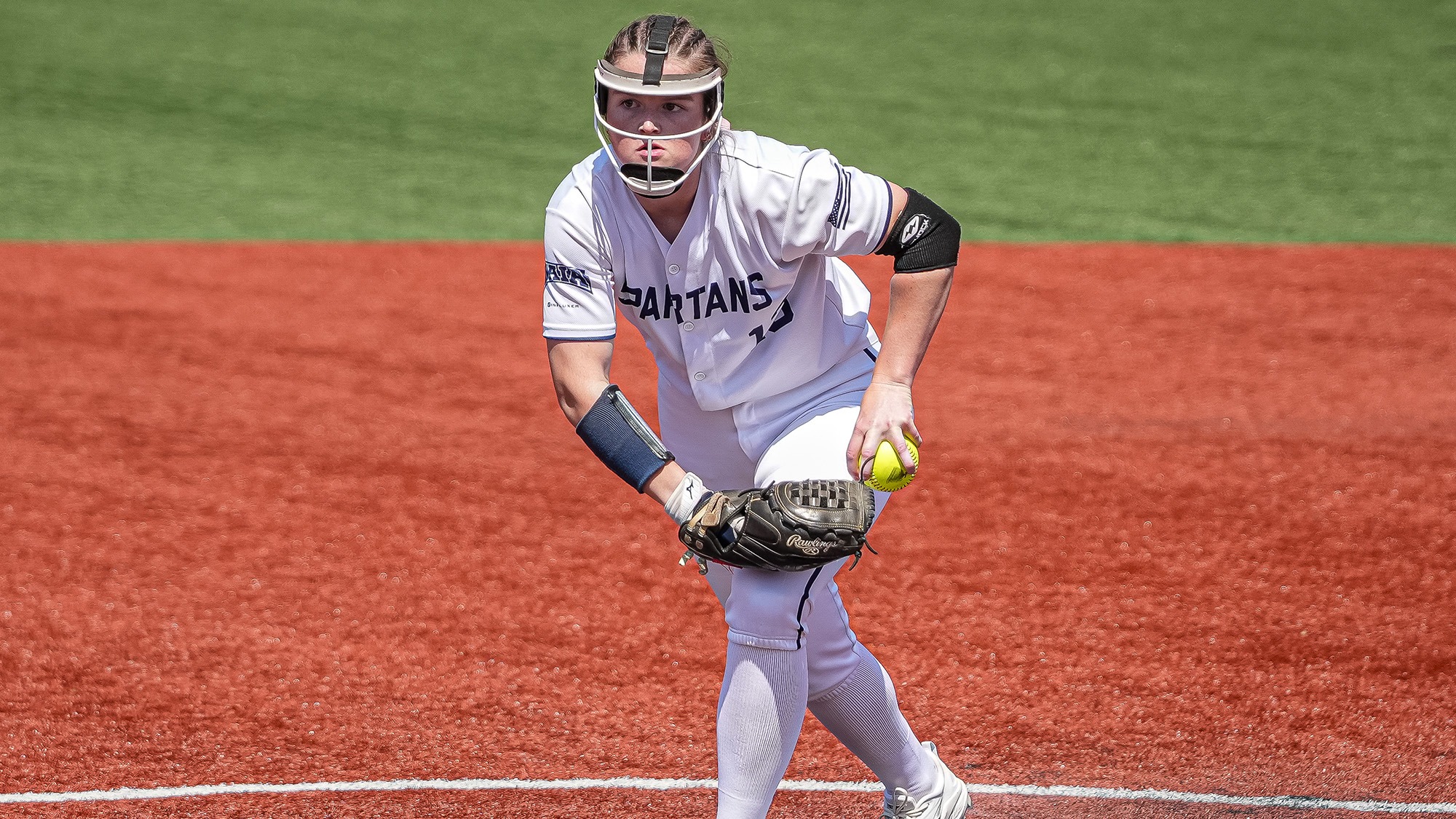 Brooklynn Fischer pitches at Maryville University vs Mission