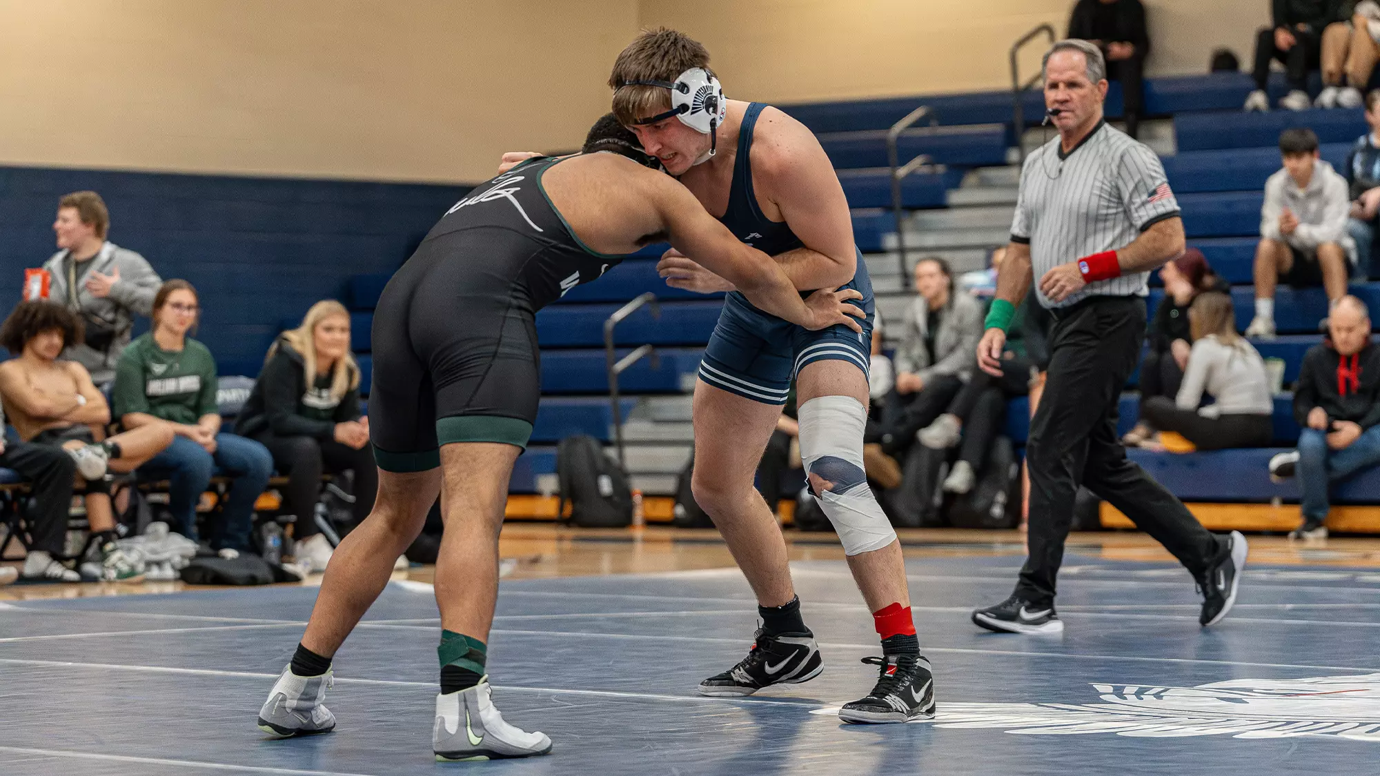 Blake Johnson wrestles opponent from William Woods (Mo.)