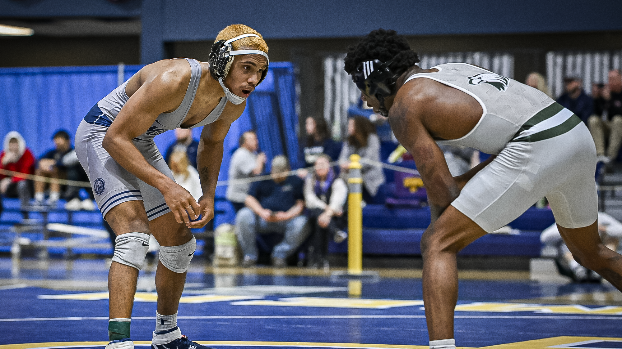 Mills wrestles opponent from Central Methodist (Mo.) at the Heart of America Athletic Conference Championships