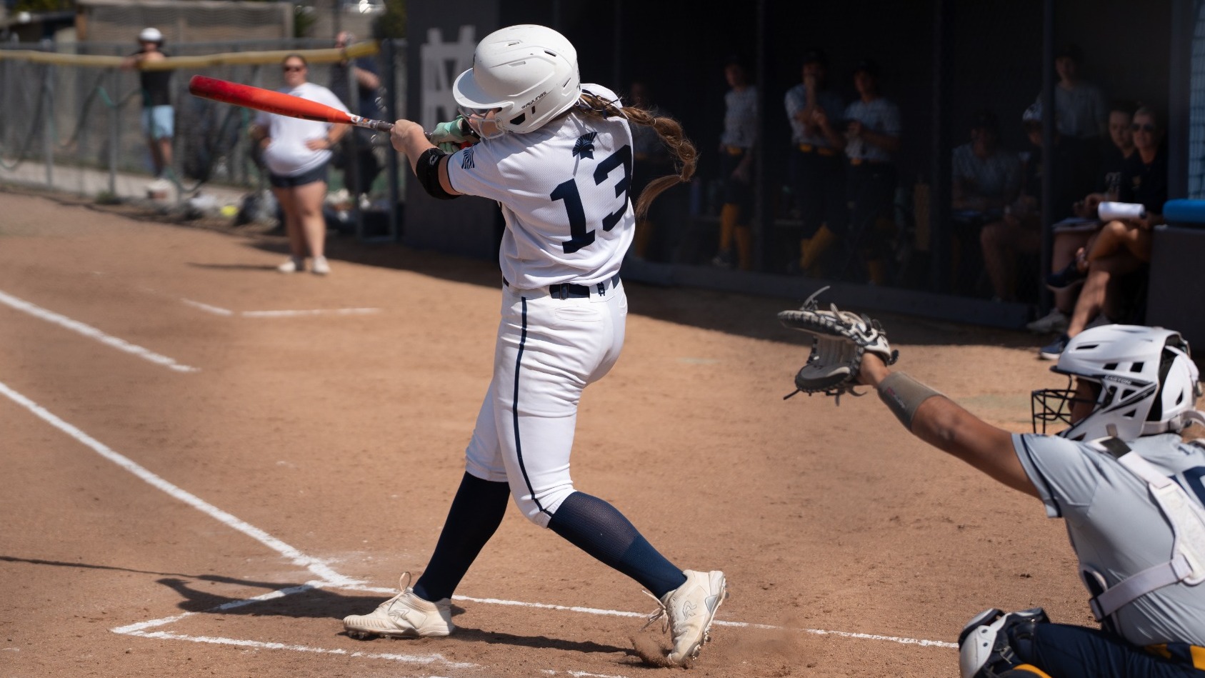 Brooke Fischer hits against William Penn