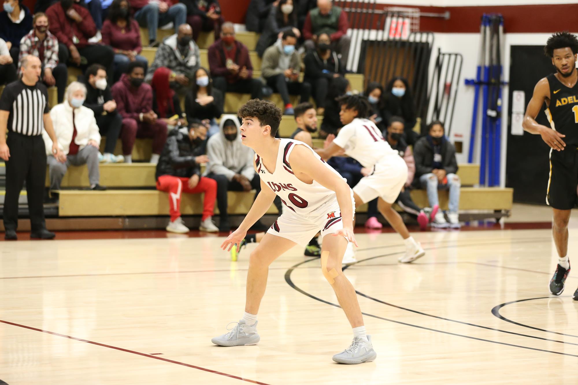 Reyes Nets CareerHigh in Men's Basketball Victory Over Holy Family