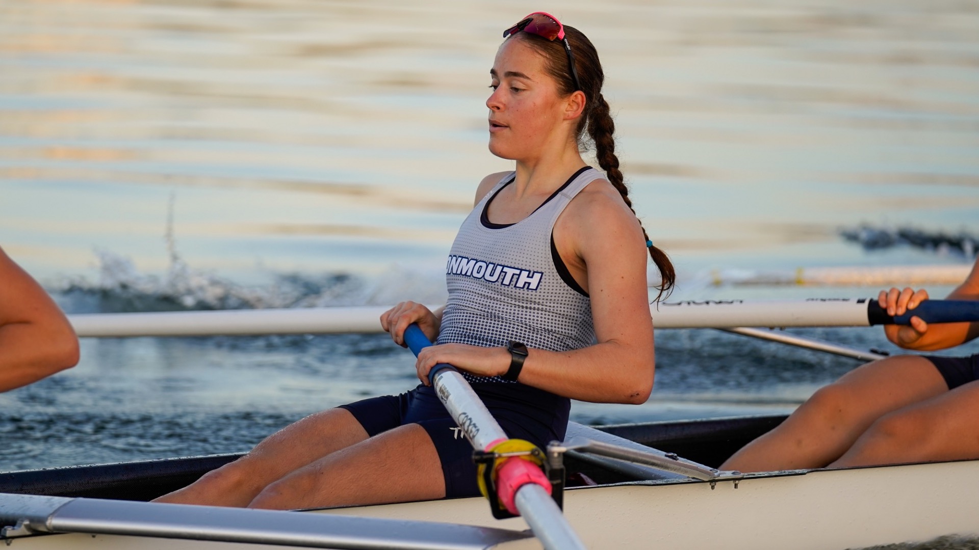 Audreanne Gill with an oar in her hand on the water