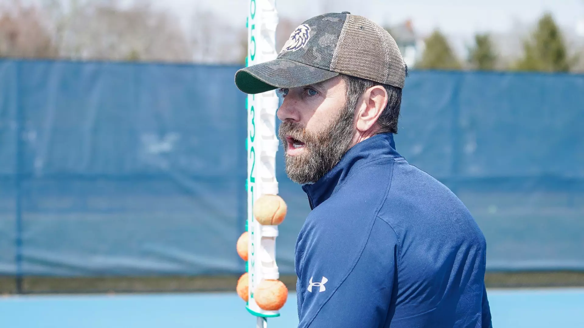 Chris Leicht looks over his shoulder at something while on the court