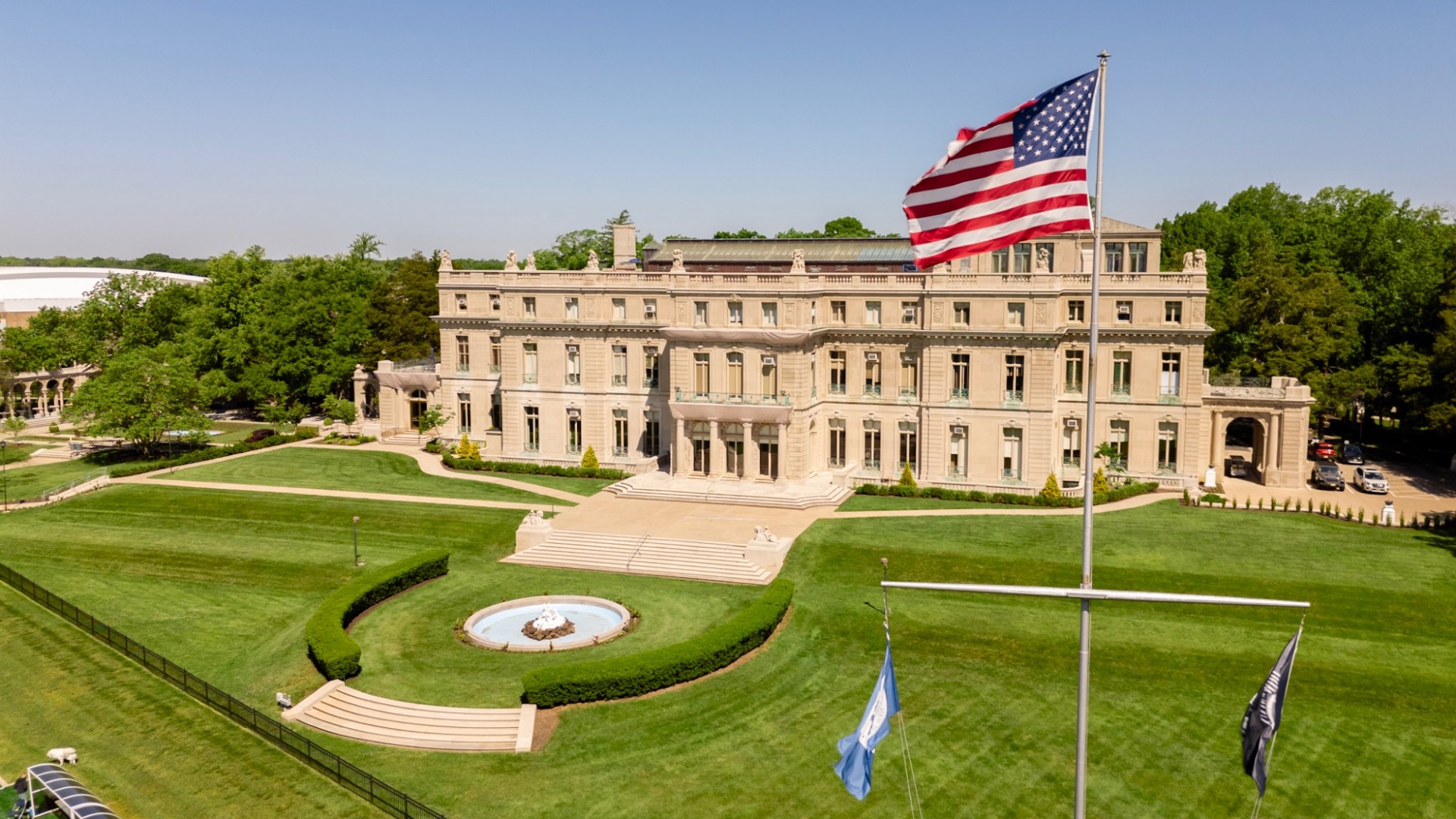 Outside of the Great Hall with the American Flag (Campus Shots)