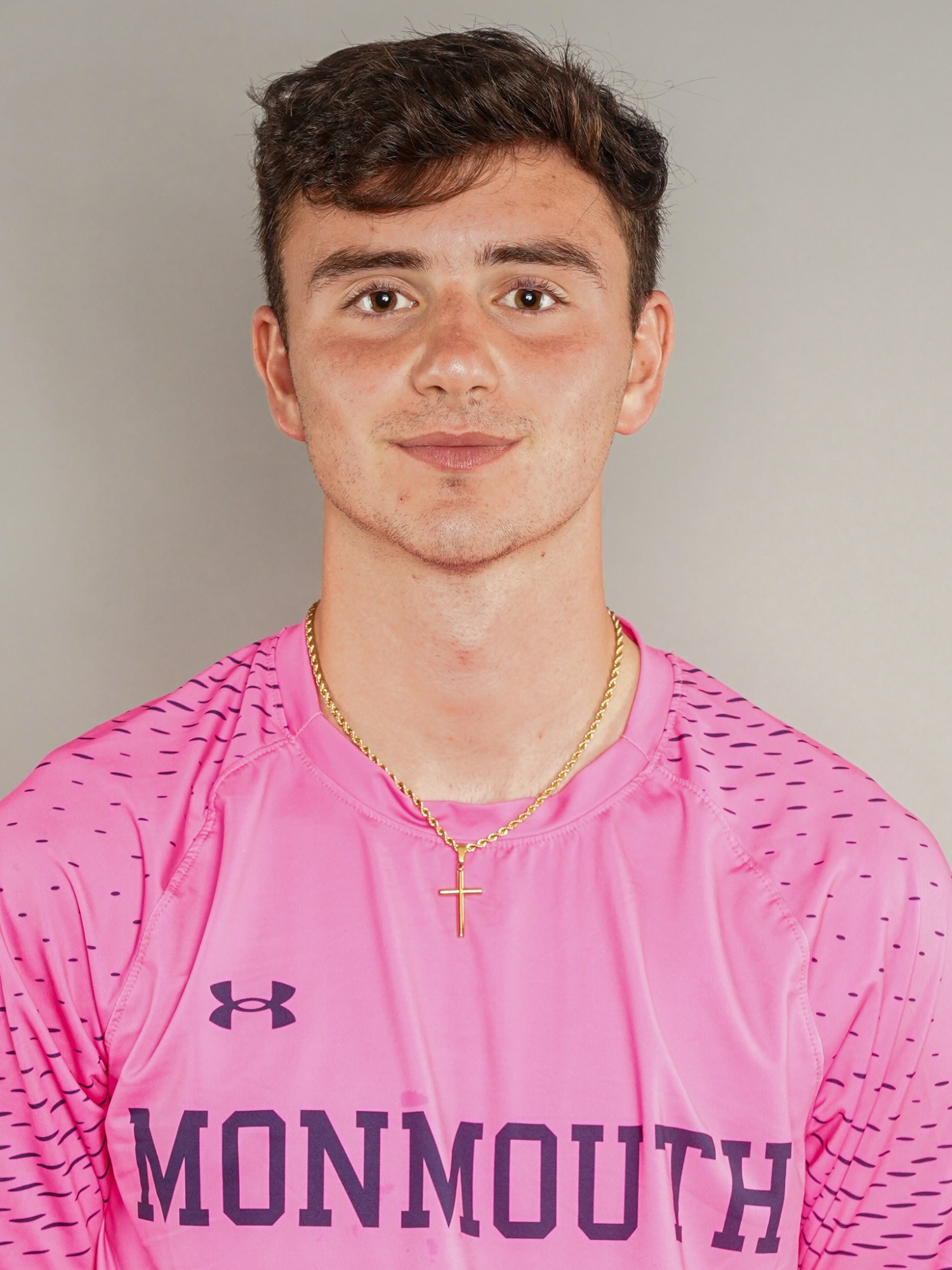 Otto Moosbrugger (head and shoulders mug shot in a blue jersey with white dotes and Monmouth script)